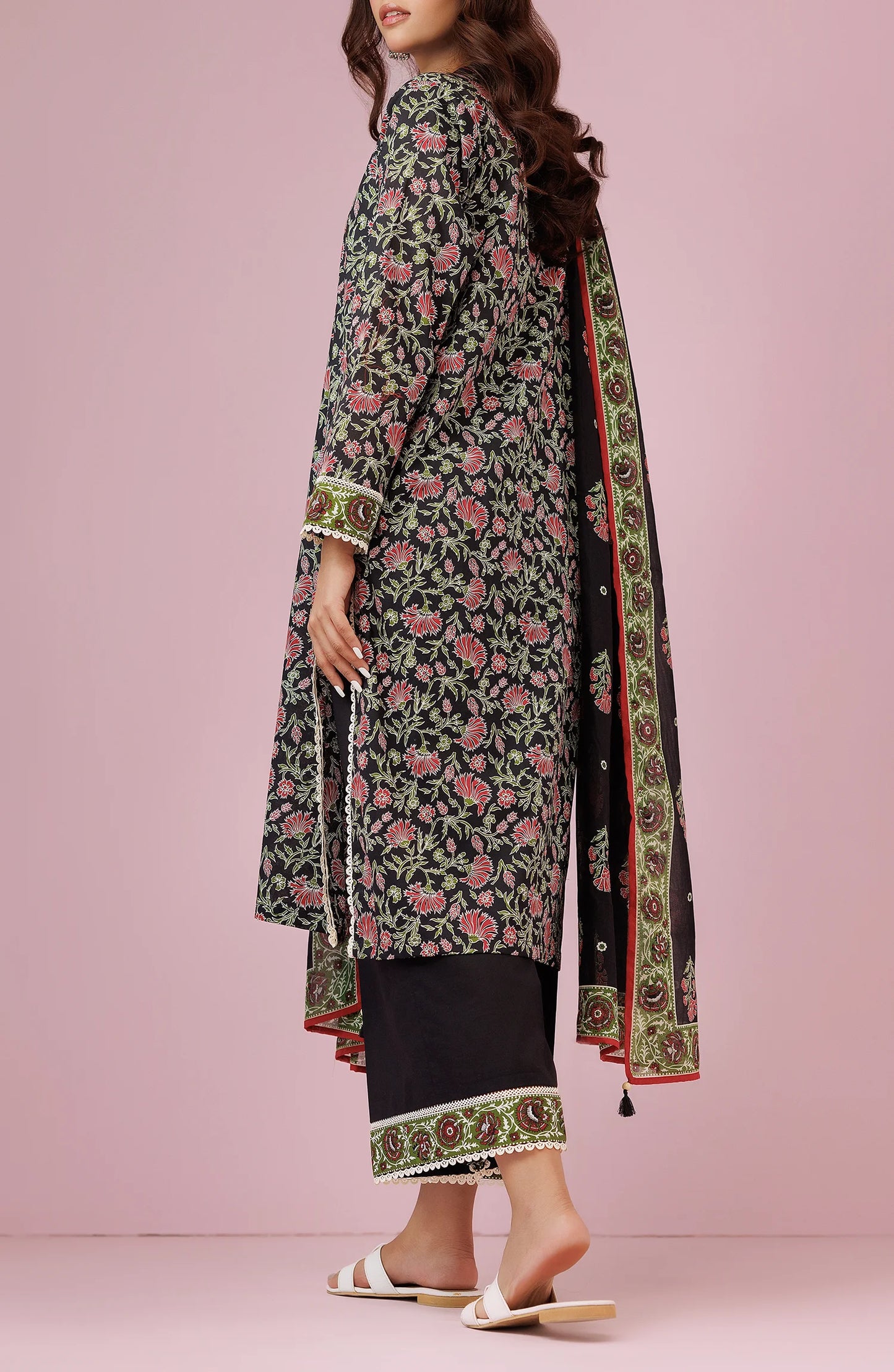 Woman wearing a floral dress with a black dupatta on a black trouser. Unstitched Printed Lawn Shirt Dupatta & Pant - 3 Piece Suits - OTL-20075
