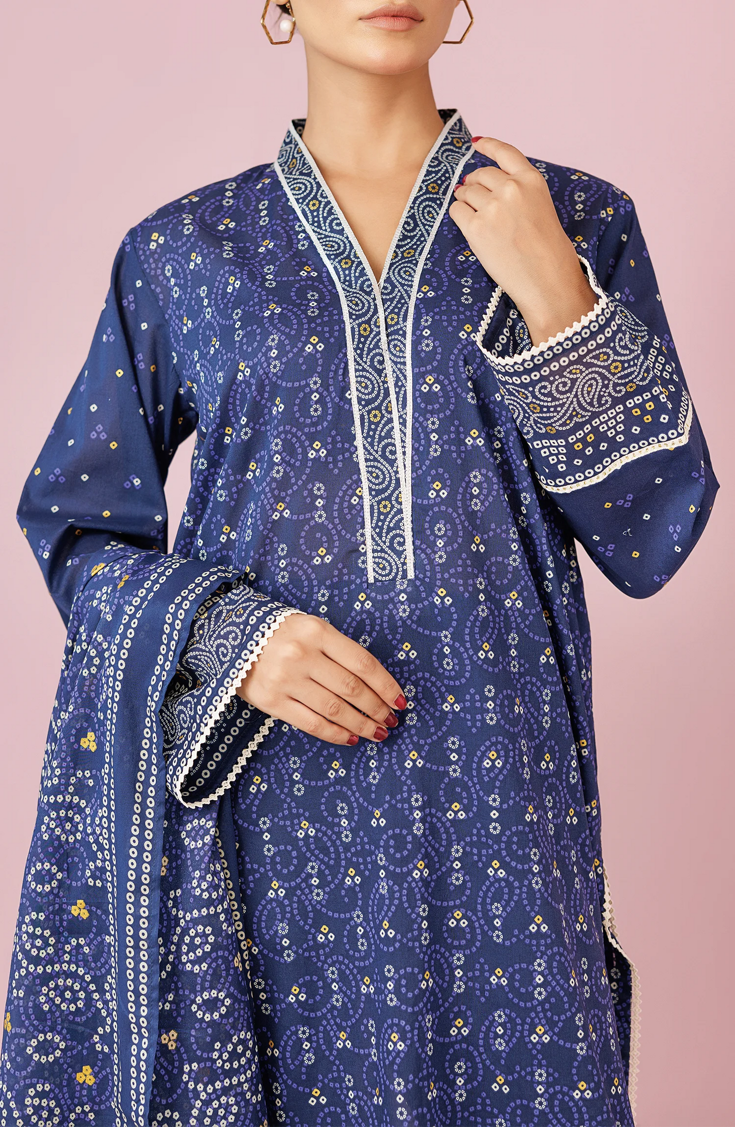 Woman wearing a blue patterned outfit with a matching dupatta on a traditional blue trouser. Unstitched Printed Lawn Shirt Dupatta & Pant - 3 Piece Suits - OTL-20105