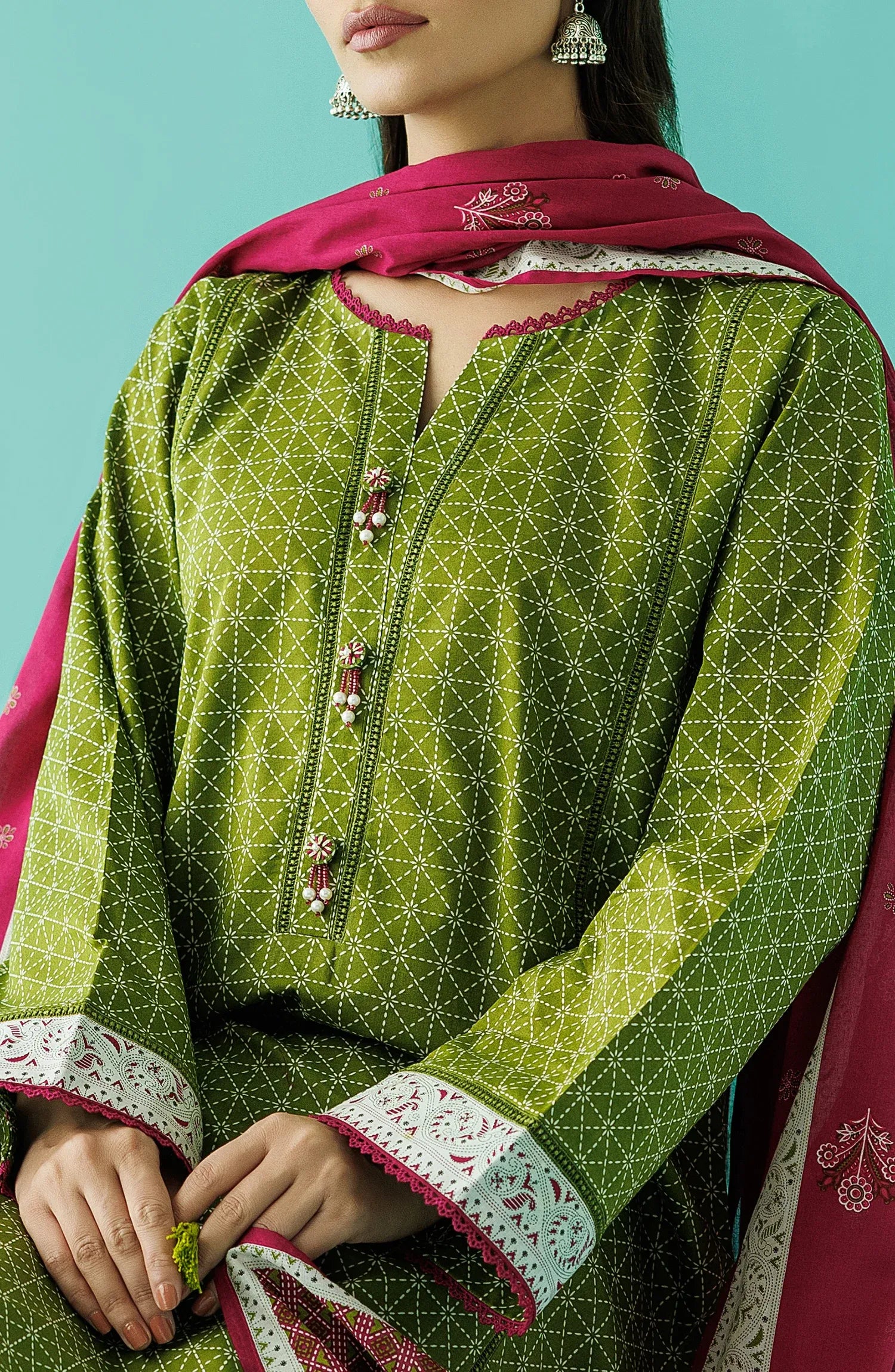 Woman wearing a green kurta with a pink dupatta on a green shalwar. Unstitched Printed Lawn Shirt Dupatta & Pant - 3 Piece Suits - OTL-20145
