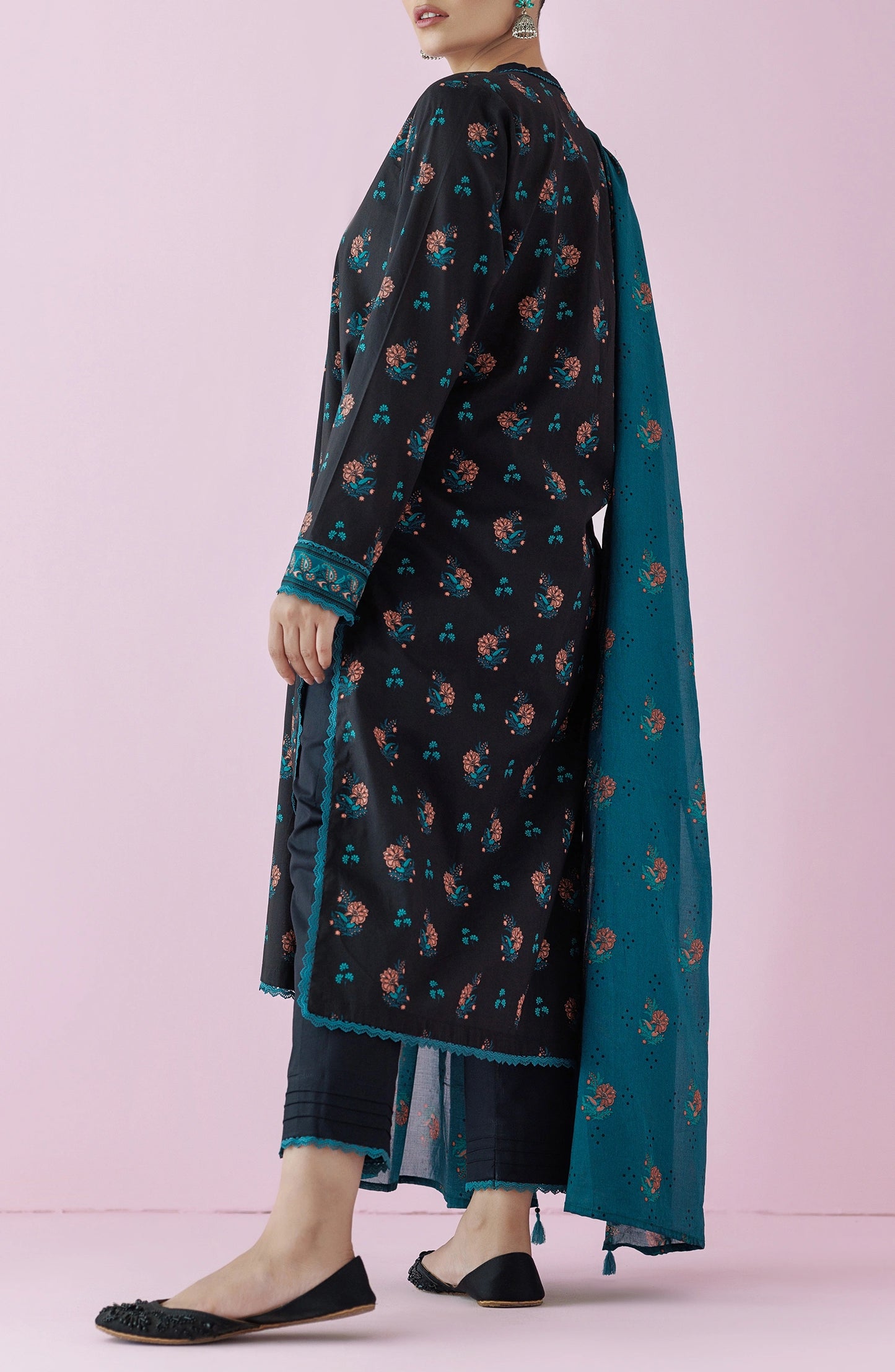 Woman wearing a black floral dress with a teal dupatta on a plain black trouser. Unstitched Printed Lawn Shirt Dupatta & Pant - 3 Piece Suits - OTL-20155
