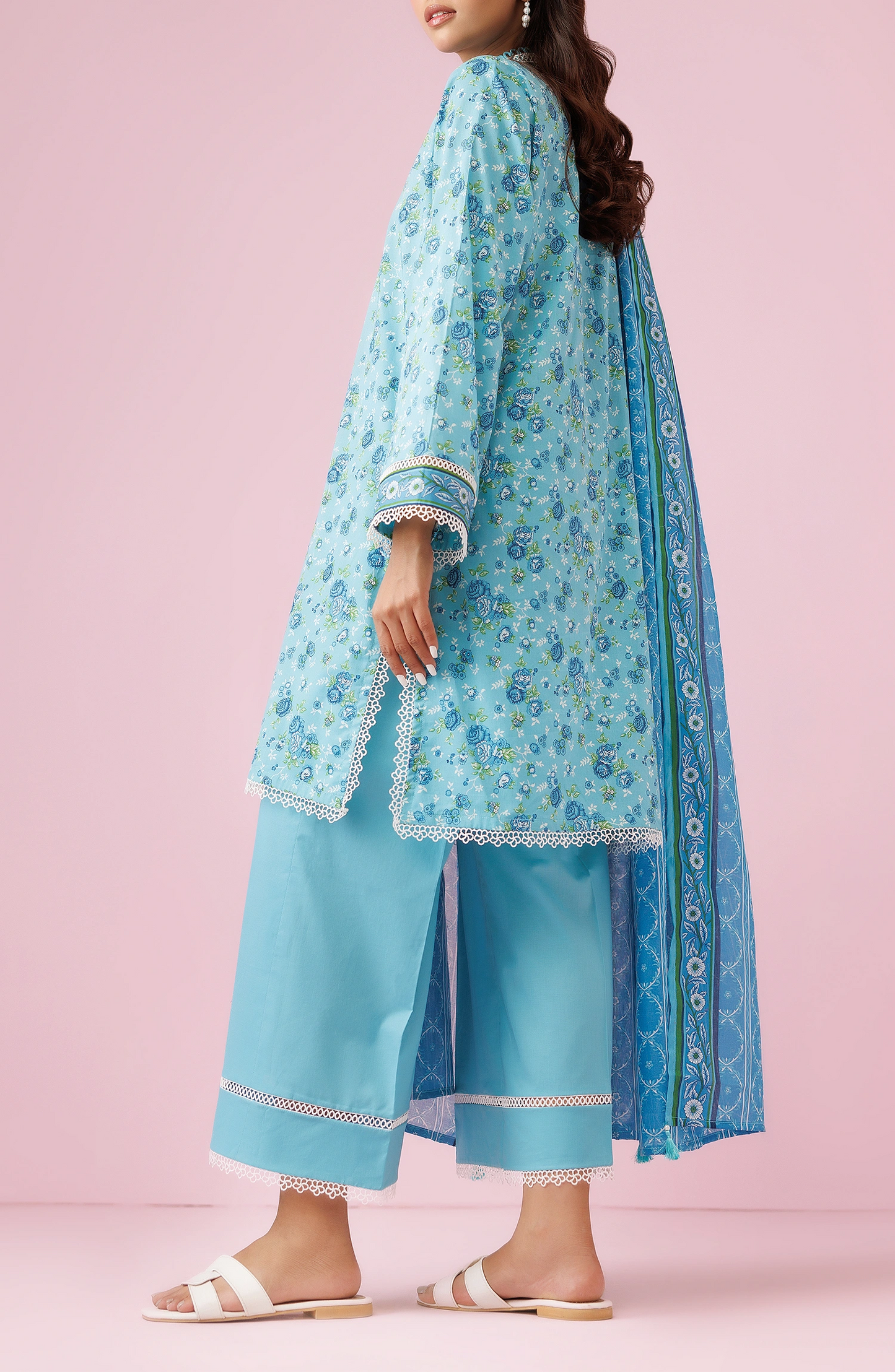 Woman wearing a blue printed outfit with a matching dupatta on a plain trosuer. Unstitched Printed Lawn Shirt Dupatta & Pant - 3 Piece Suits - OTL-20185