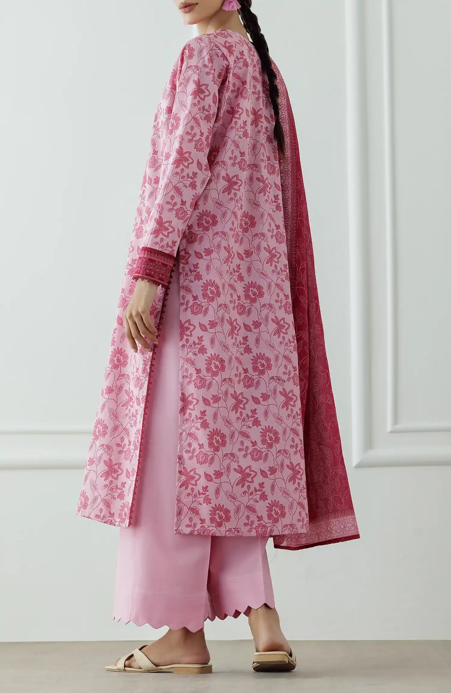 Woman wearing a pink floral kurta with a matching dupatta against a plain trouser. Stitched Printed Lawn Shirt Dupatta & Pant - 3 Piece Suits - OTL-25-058