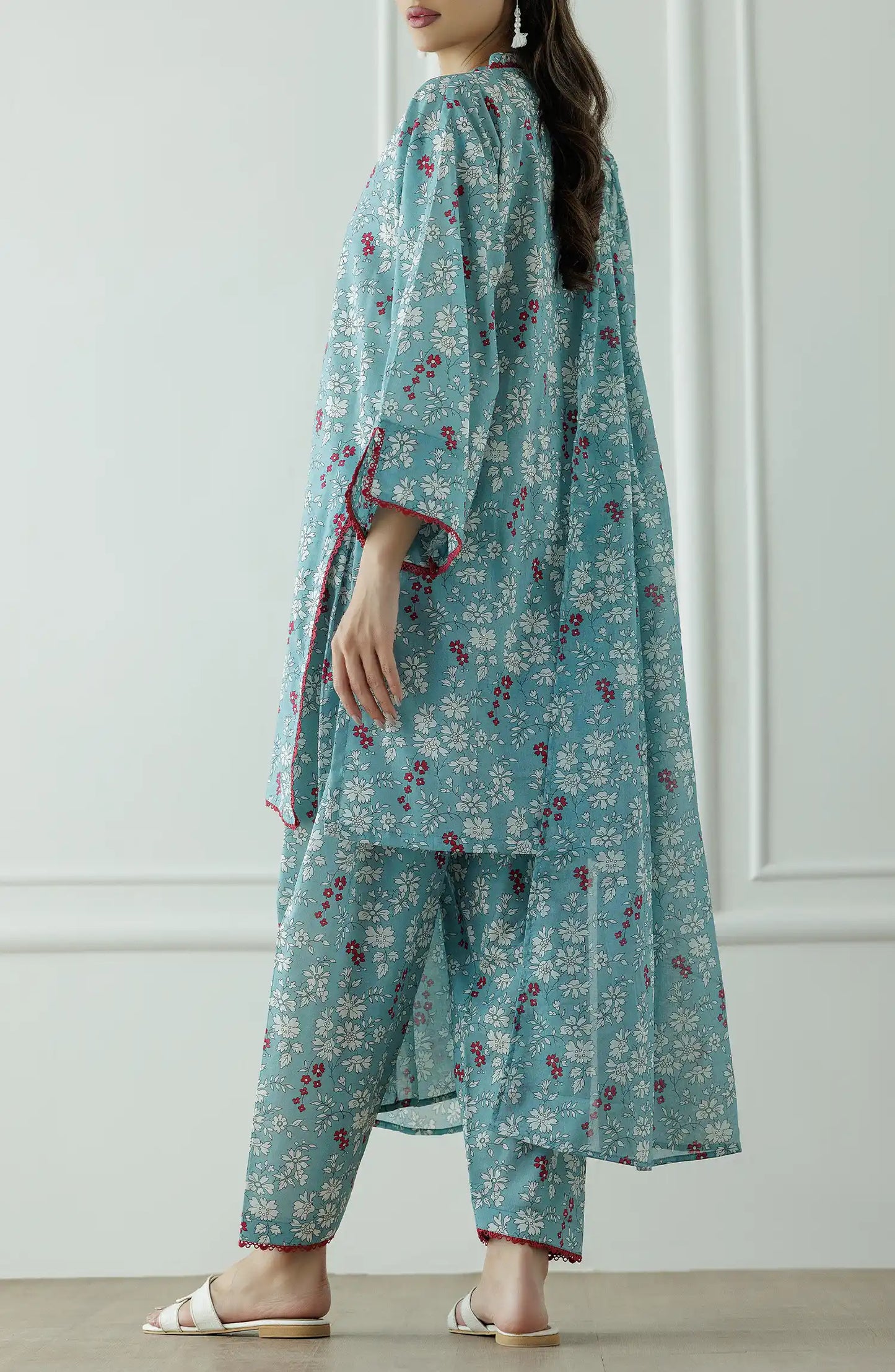 Stitched Printed Lawn Shirt Dupatta & Pant - 3 Piece - OTL-25-067. Woman wearing a teal floral traditional outfit with a printed lawn dupatta.