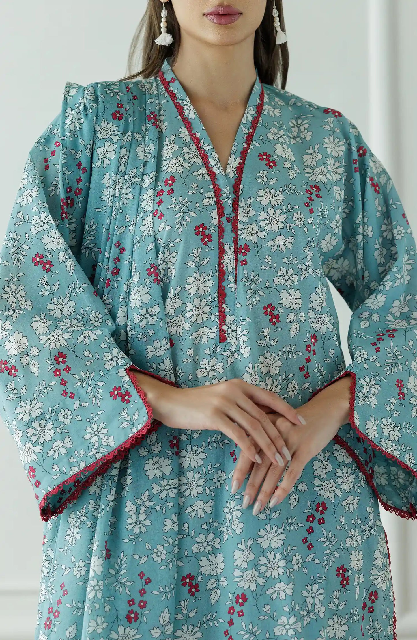 Stitched Printed Lawn Shirt Dupatta & Pant - 3 Piece - OTL-25-067. Woman wearing a teal floral traditional outfit with a printed lawn dupatta.