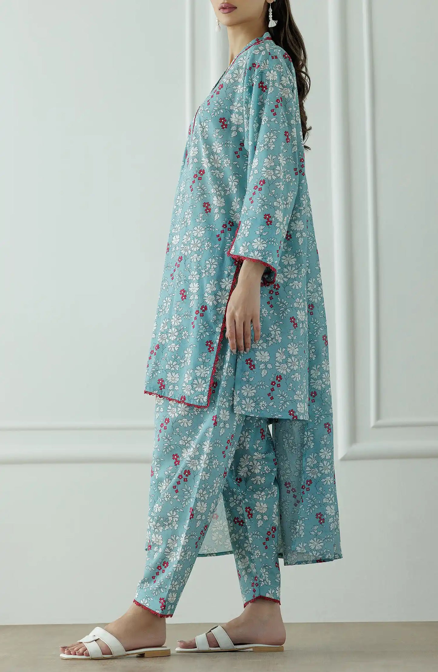 Stitched Printed Lawn Shirt Dupatta & Pant - 3 Piece - OTL-25-067. Woman wearing a teal floral traditional outfit with a printed lawn dupatta.