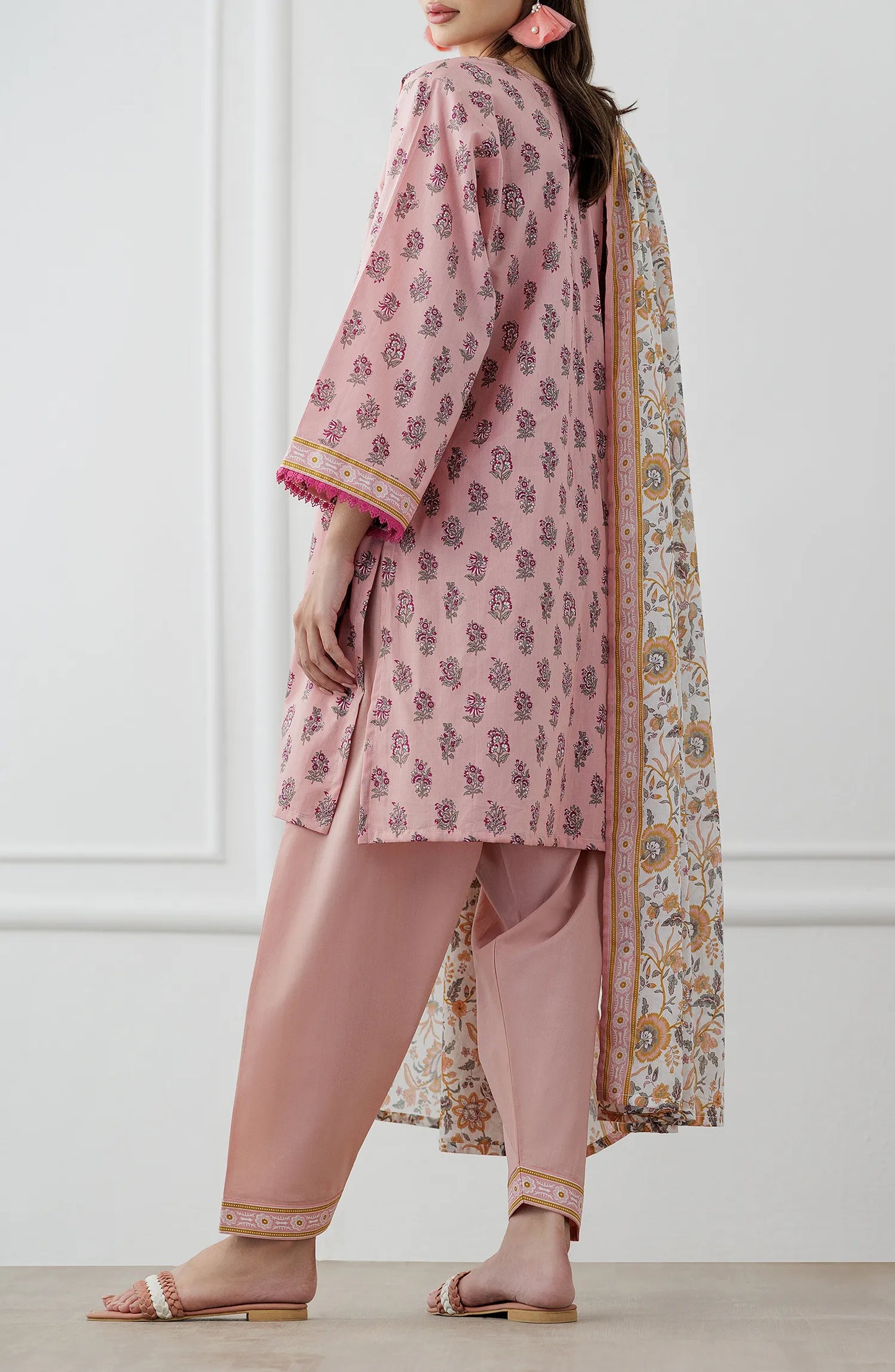 Woman wearing a pink traditional outfit with a matching dupatta on a dyed trouser. Stitched Printed Lawn Shirt Dupatta & Pant - 3 Piece Suits - OTL-25-358
