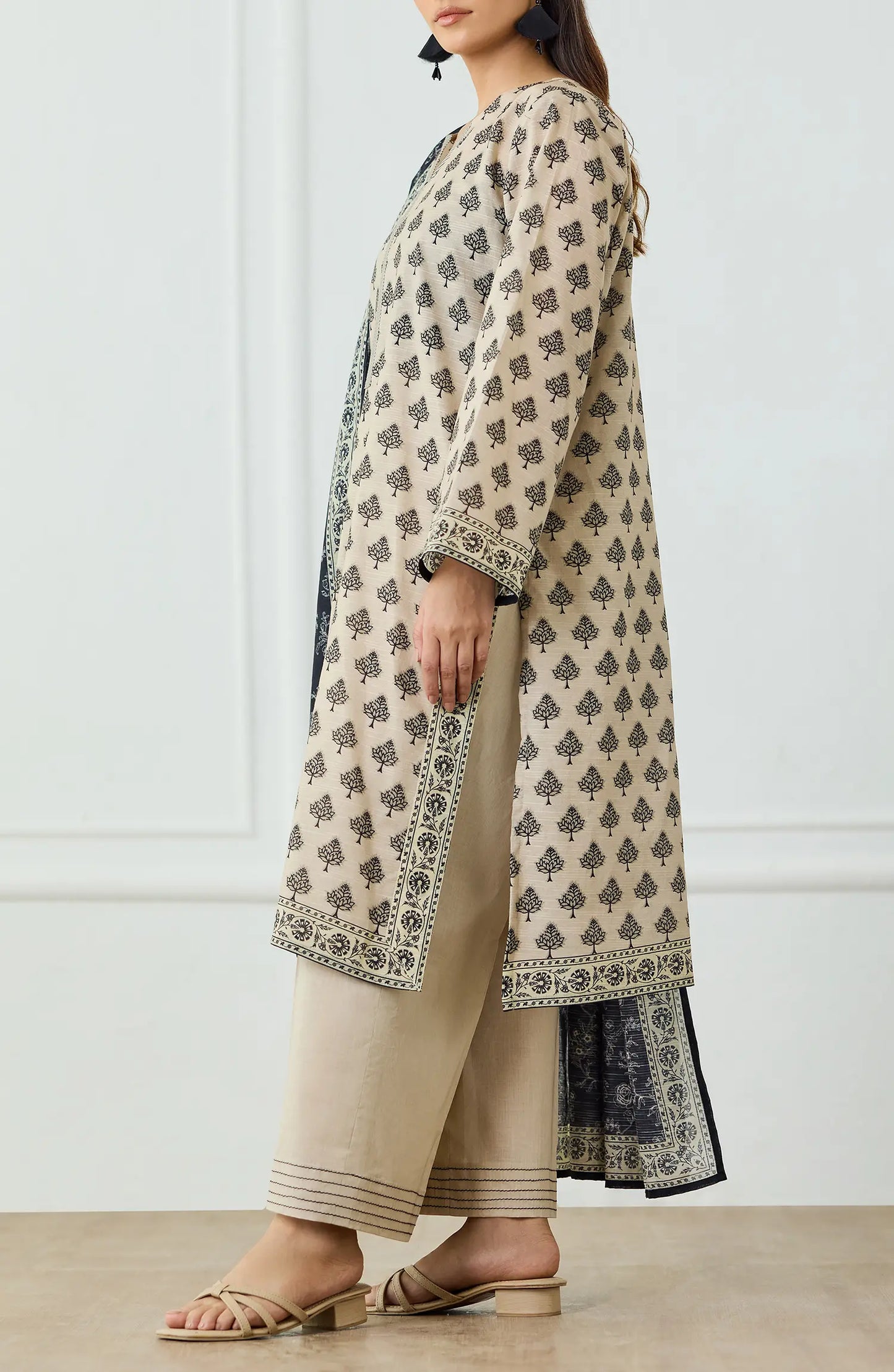 Woman wearing a patterned kurta with a matching dupatta on a dyed trouser. UNSTITCHED Printed Lawn Shirt Dupatta & Pant - 3 Piece Suits - OTL-25-461