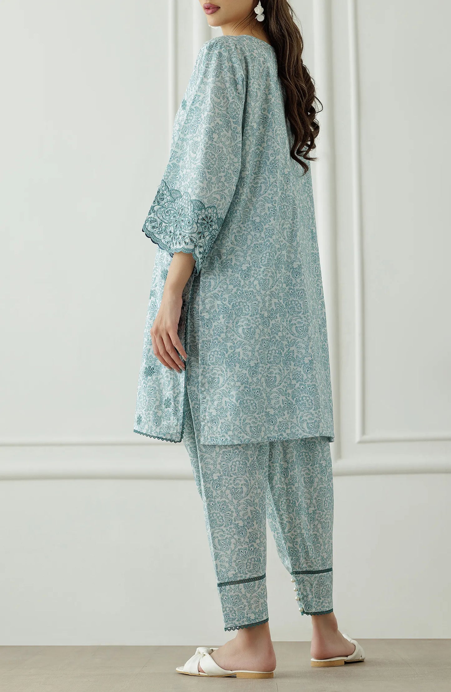Woman wearing a light blue traditional outfit with floral patterns, Stitched Printed Lawn Shirt & Pant - 2 Piece Suits (Co-ord Set) - WRCC25S-2047