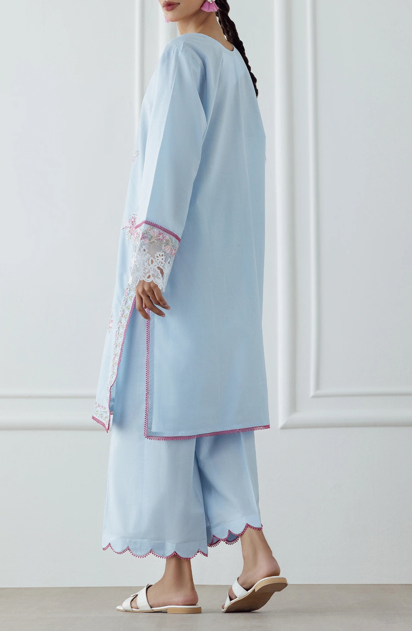 Women wearing a Light blue dress with intricate embroidery on a dyed trouser. Stitched Luxury Premium Embroidered Lawn Shirt & Pant - 2 Piece Suits (Co-ord Set) - WRCJ25S-2007
