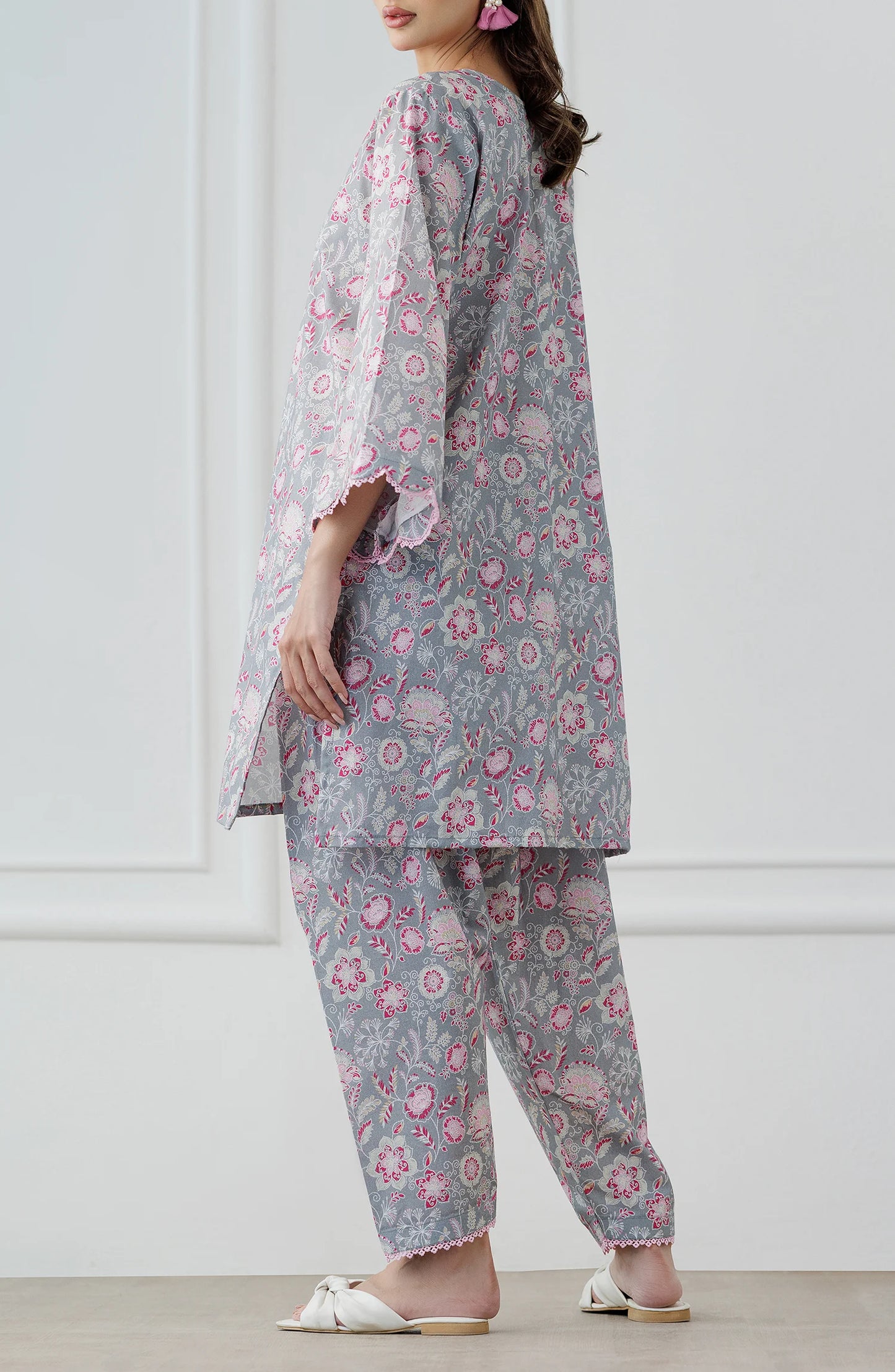 Woman wearing a floral outfit with a gray base shirt & trouser. Stitched Printed Lawn Shirt & Pant - 2 Piece Suits (Co-ord Set) - WRCV25S-2016