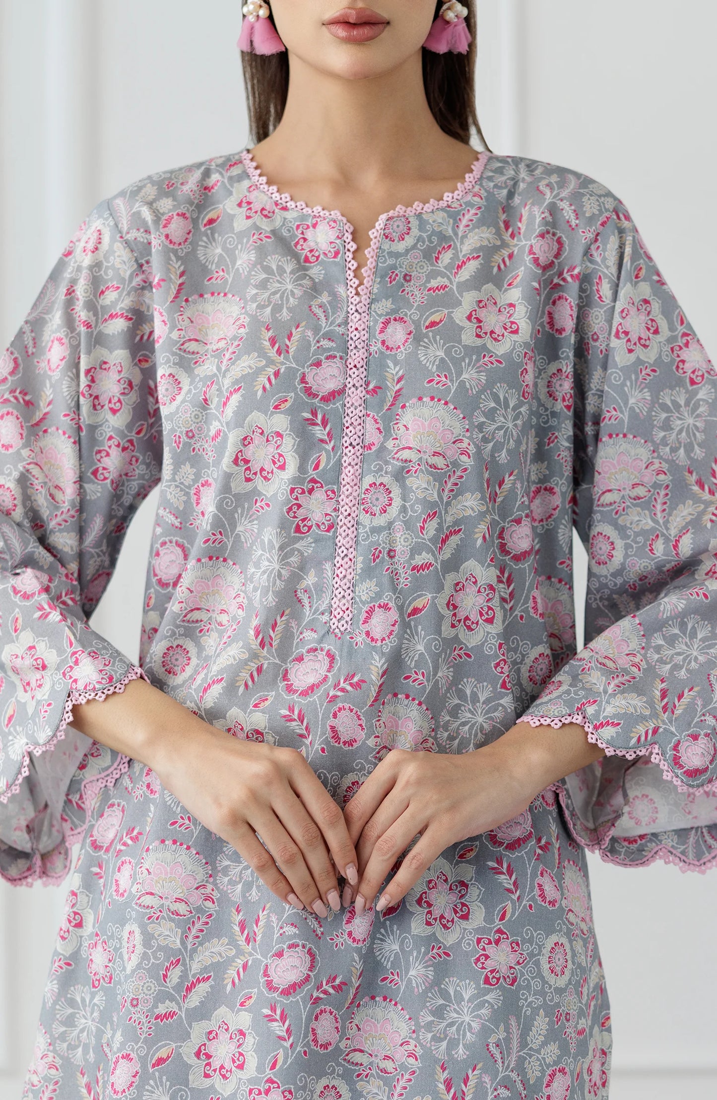 Woman wearing a floral outfit with a gray base shirt & trouser. Stitched Printed Lawn Shirt & Pant - 2 Piece Suits (Co-ord Set) - WRCV25S-2016