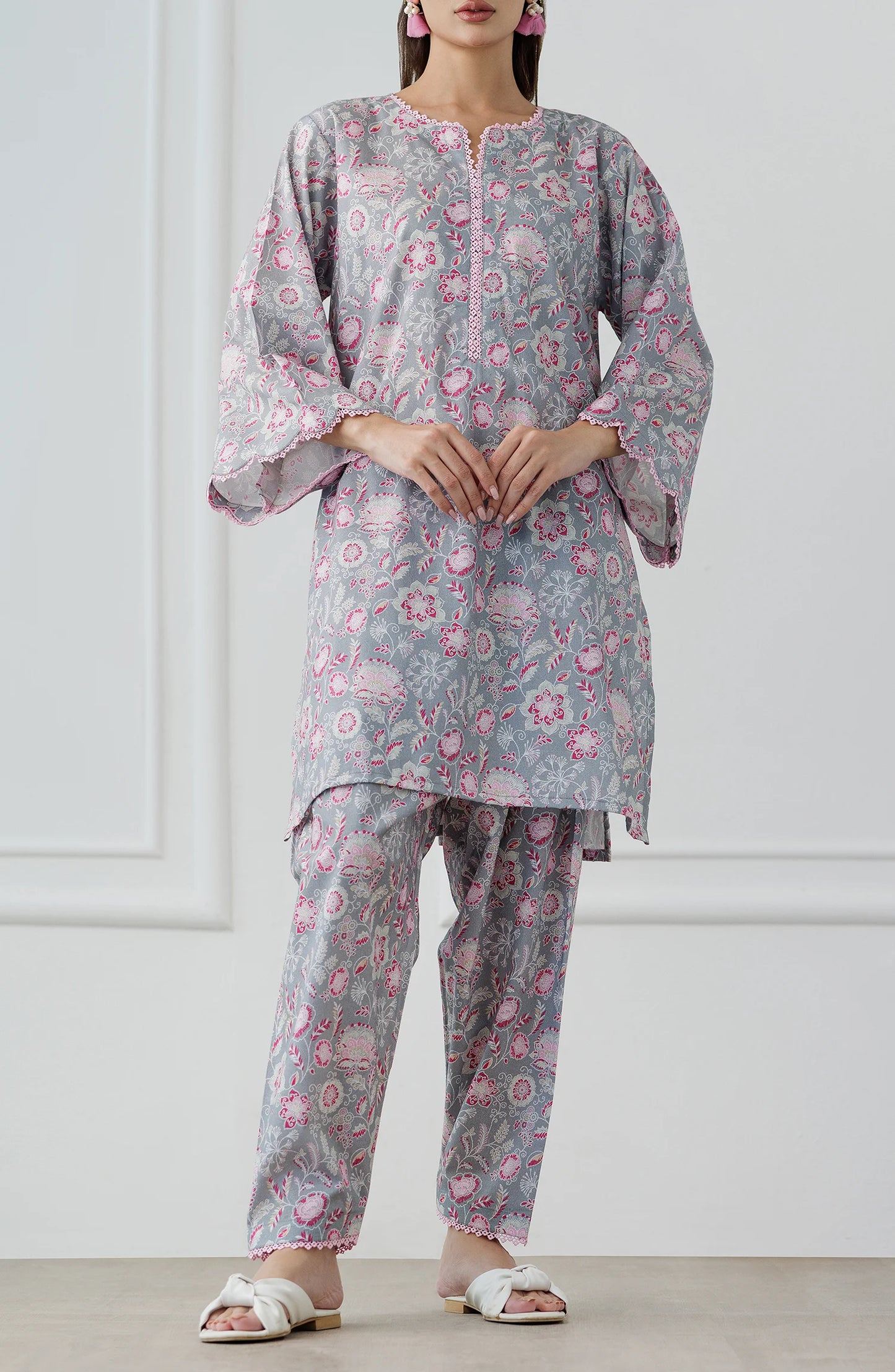 Woman wearing a floral outfit with a gray base shirt & trouser. Stitched Printed Lawn Shirt & Pant - 2 Piece Suits (Co-ord Set) - WRCV25S-2016