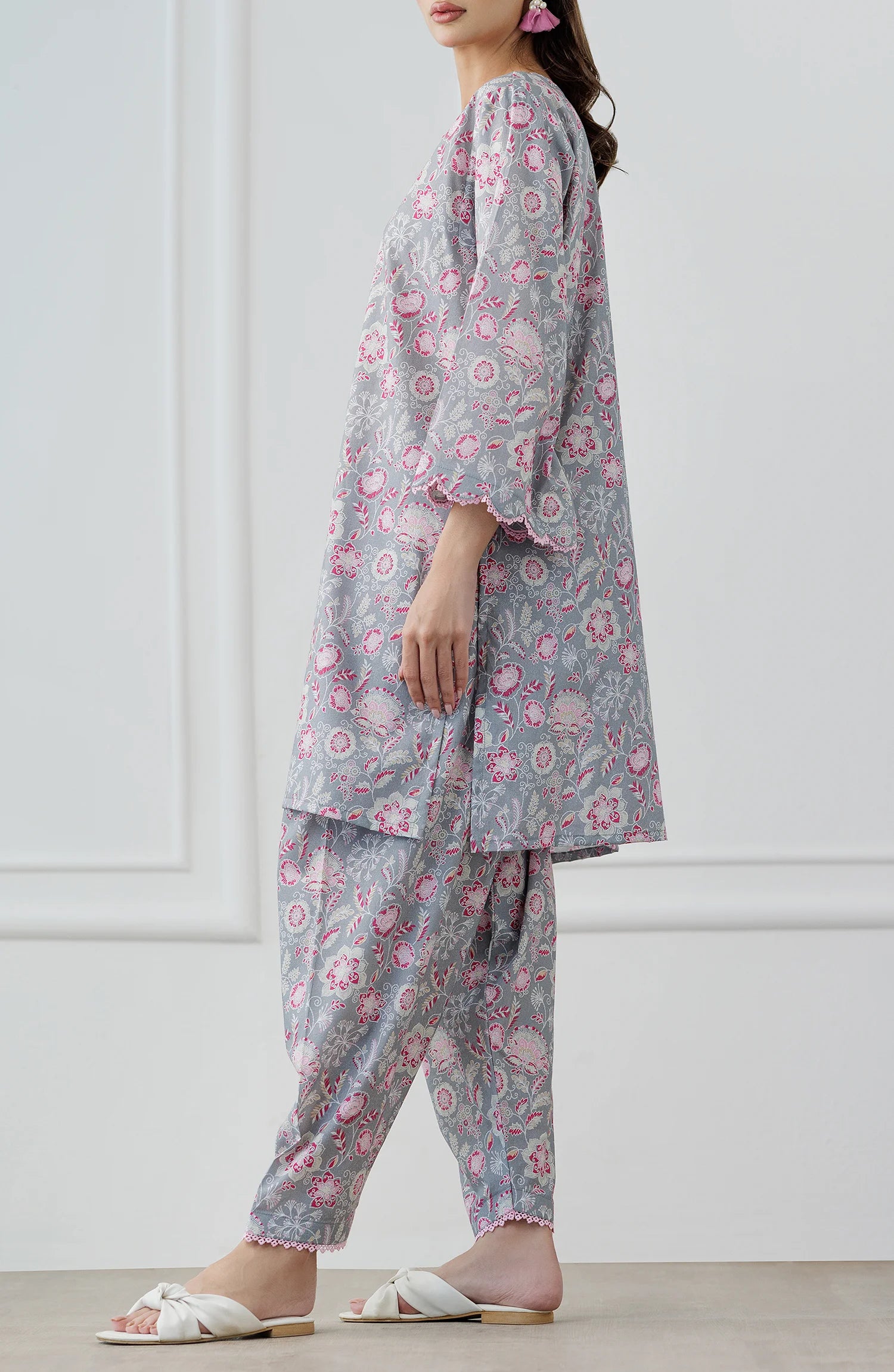 Woman wearing a floral outfit with a gray base shirt & trouser. Stitched Printed Lawn Shirt & Pant - 2 Piece Suits (Co-ord Set) - WRCV25S-2016