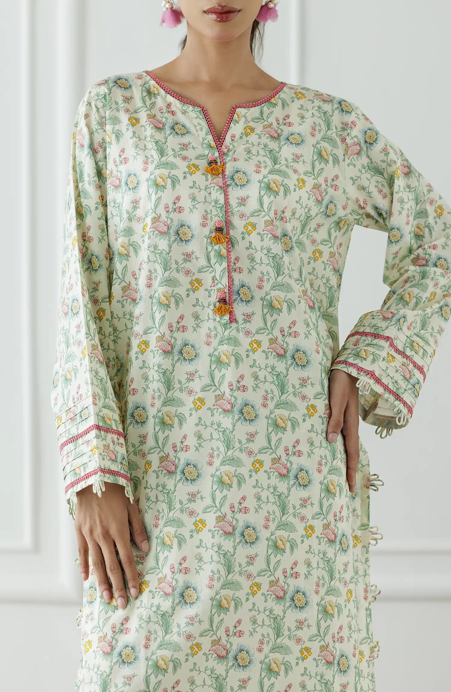 Woman wearing a floral dress with a matching paired trouser. Stitched Printed Lawn Shirt & Pant - 2 Piece Suits (Co-ord Set) - WRCV25S-2023