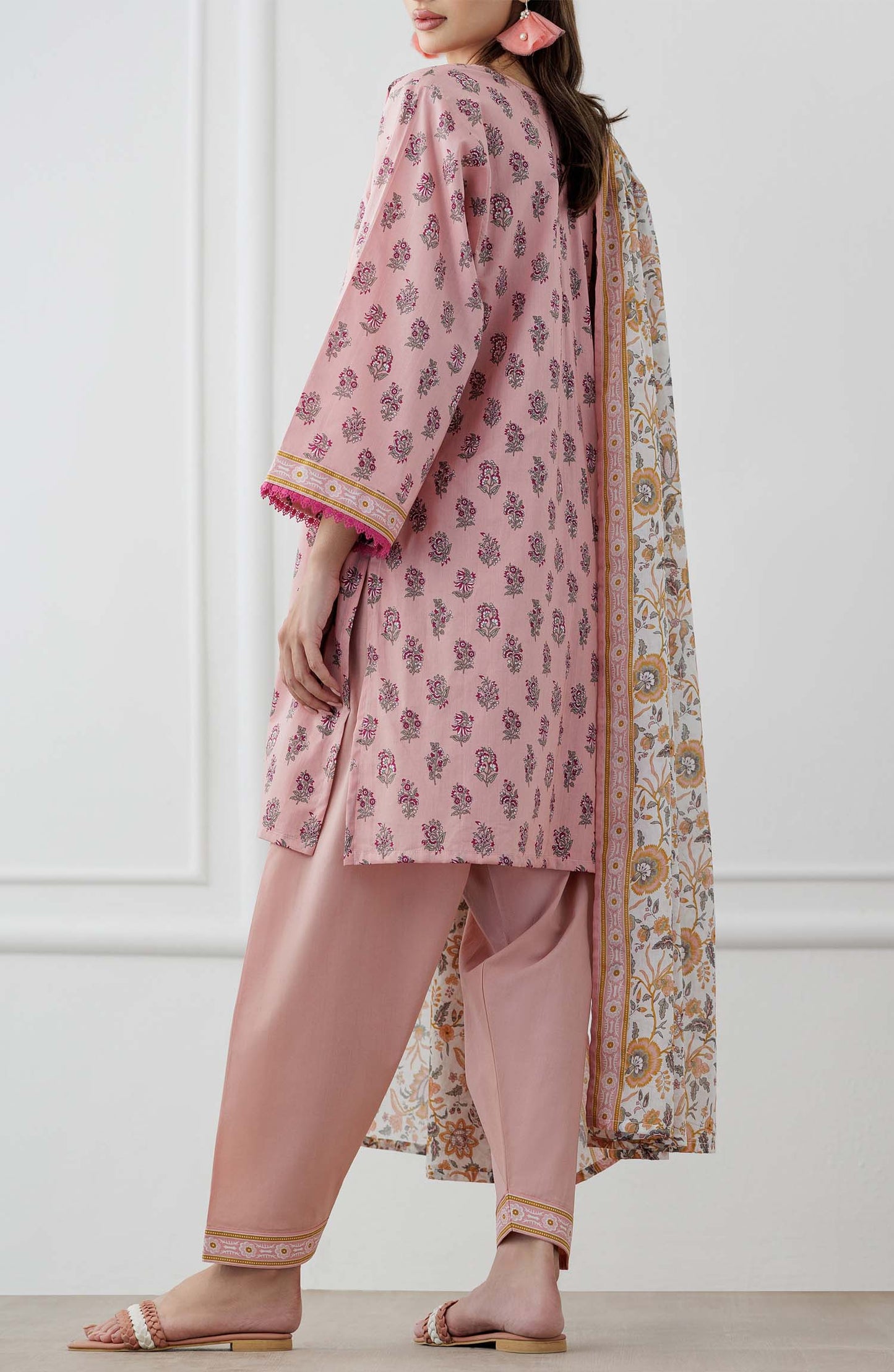 UNSTITCHED Printed Lawn Shirt Dupatta & Pant - 3 Piece Suits - OTL-25-358. Woman wearing a pink traditional outfit with a matching dupatta and dyed trouser.