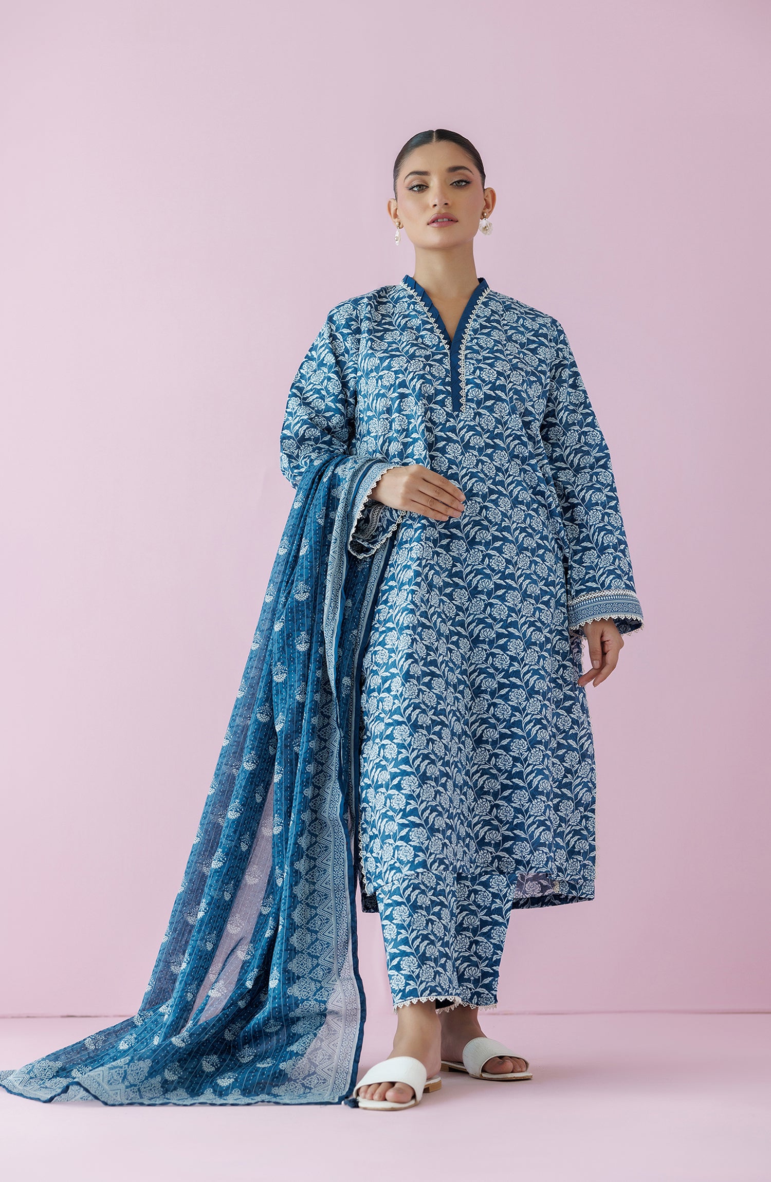 Unstitched printed lawn suits for ladies in Pakistan
