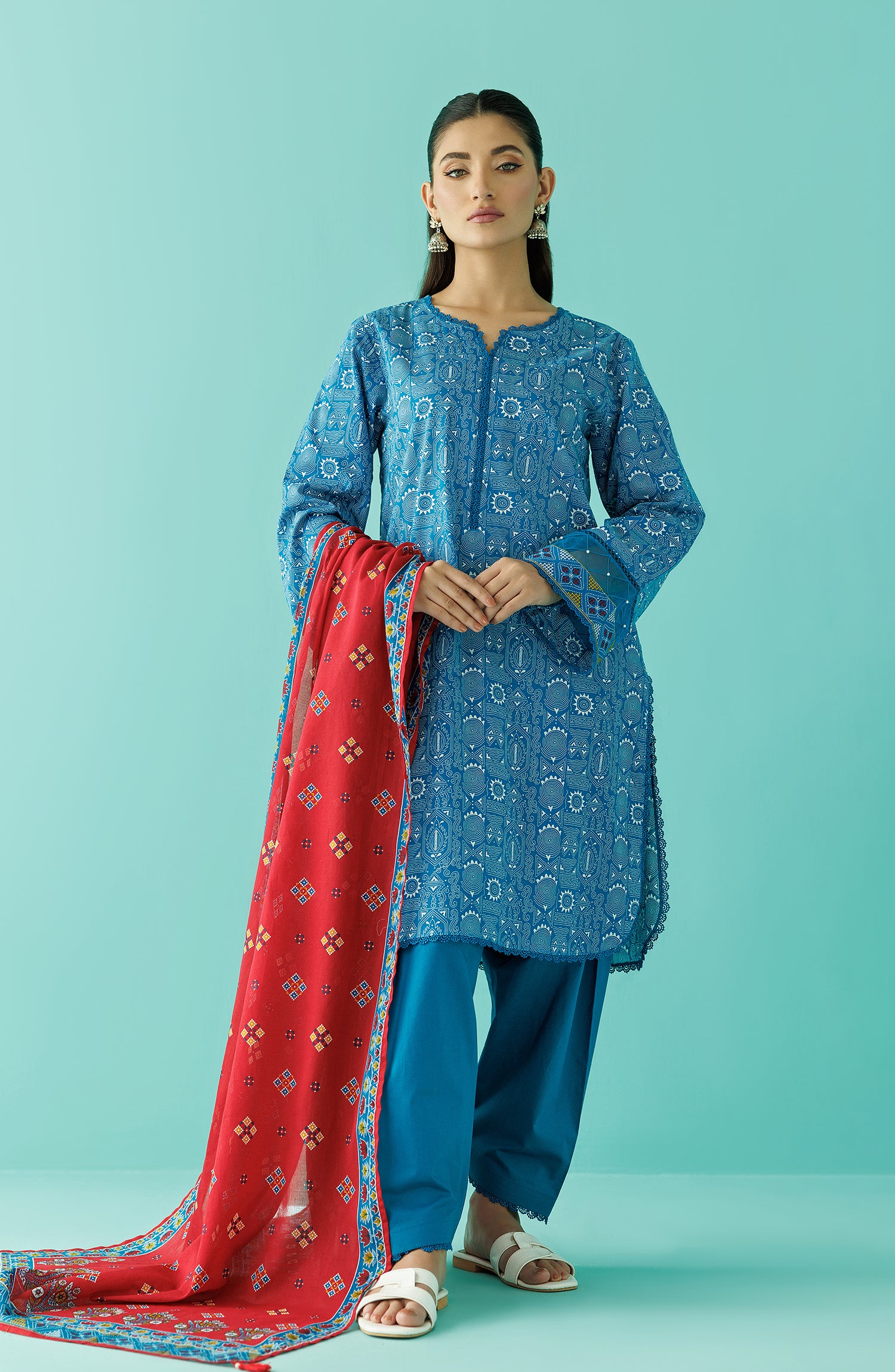 Unstitched printed lawn suit for ladies in Pakistan