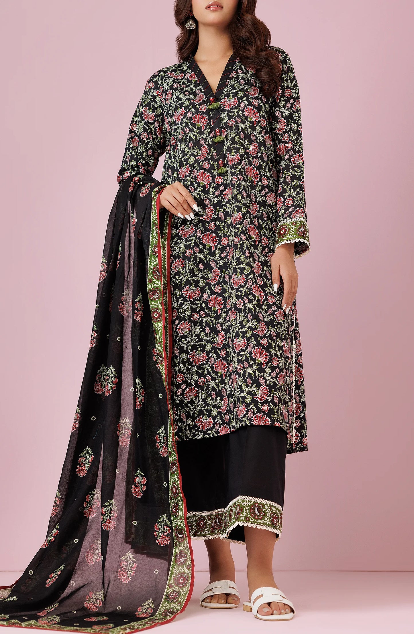 Woman wearing a floral dress with a black dupatta on a black trouser. Unstitched Printed Lawn Shirt Dupatta & Pant - 3 Piece Suits - OTL-20075