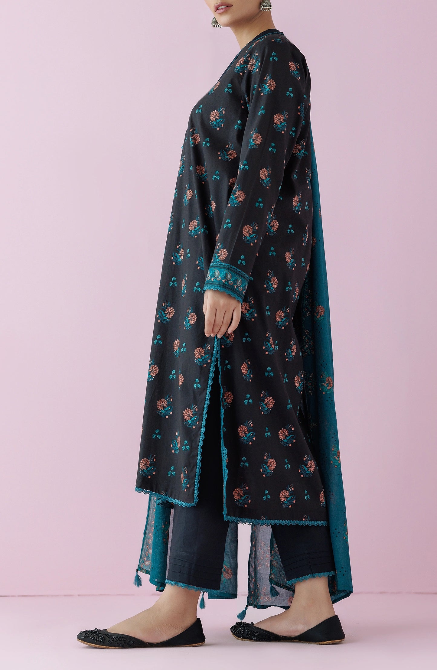 Woman wearing a black floral dress with a teal dupatta on a plain black trouser. Unstitched Printed Lawn Shirt Dupatta & Pant - 3 Piece Suits - OTL-20155