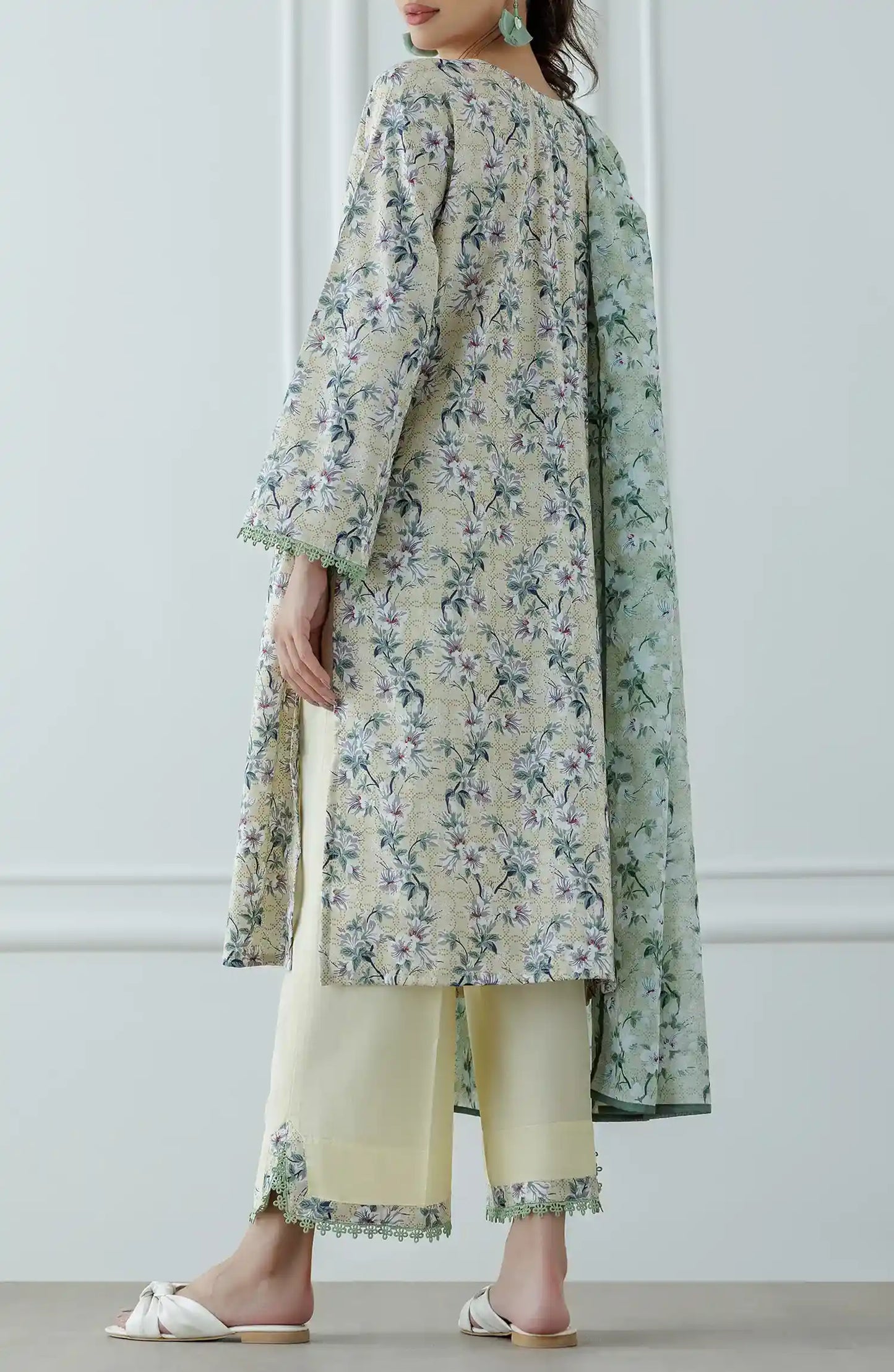 Woman wearing a floral kurta with a matching dupatta against a wide leg palazzo trouser. Stitched Printed Lawn Shirt Dupatta & Pant - 3 Piece Suits - OTL-25-041