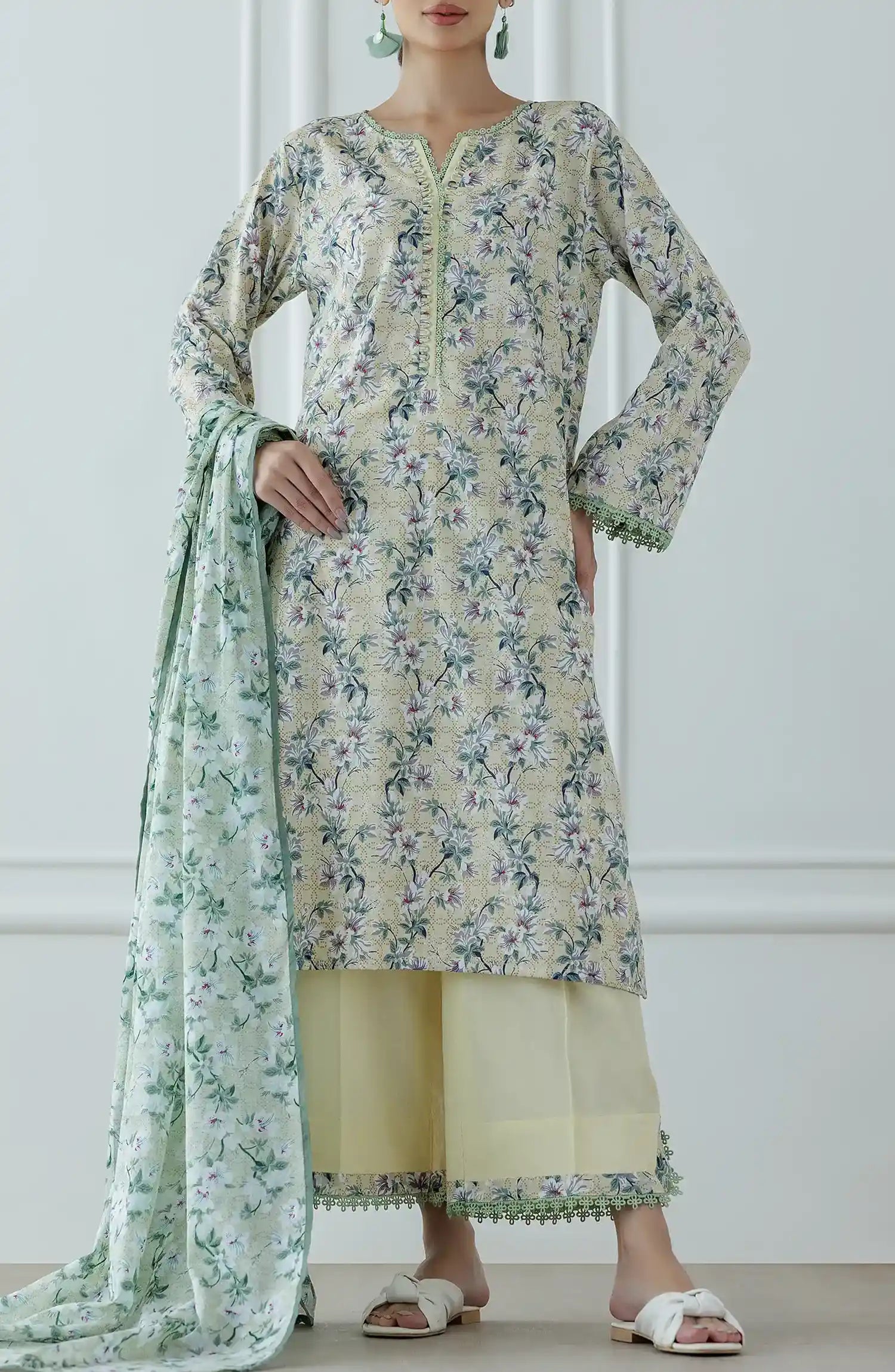 Woman wearing a floral kurta with a matching dupatta against a wide leg palazzo trouser. Stitched Printed Lawn Shirt Dupatta & Pant - 3 Piece Suits - OTL-25-041