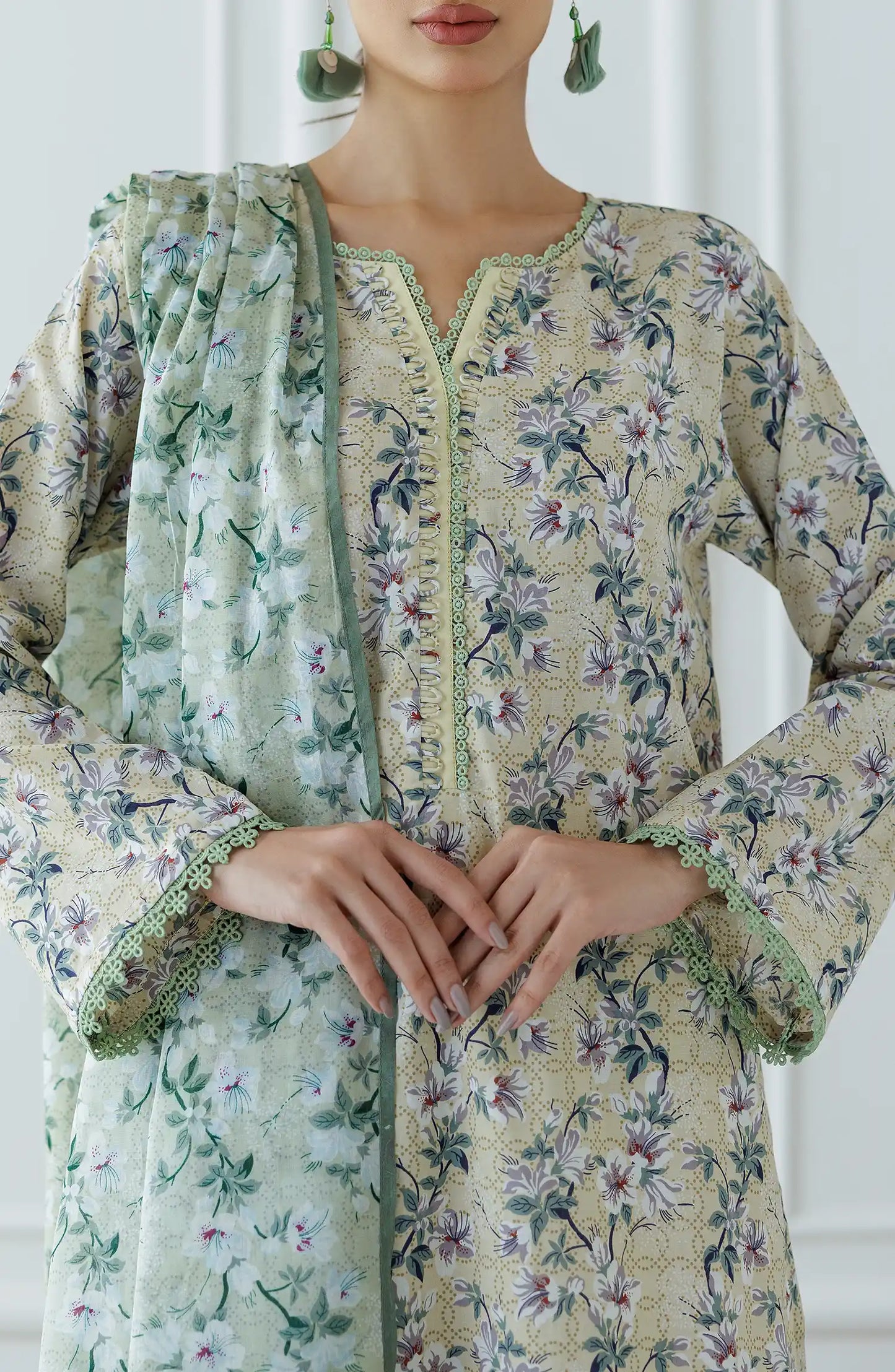 Woman wearing a floral kurta with a matching dupatta against a wide leg palazzo trouser. Stitched Printed Lawn Shirt Dupatta & Pant - 3 Piece Suits - OTL-25-041