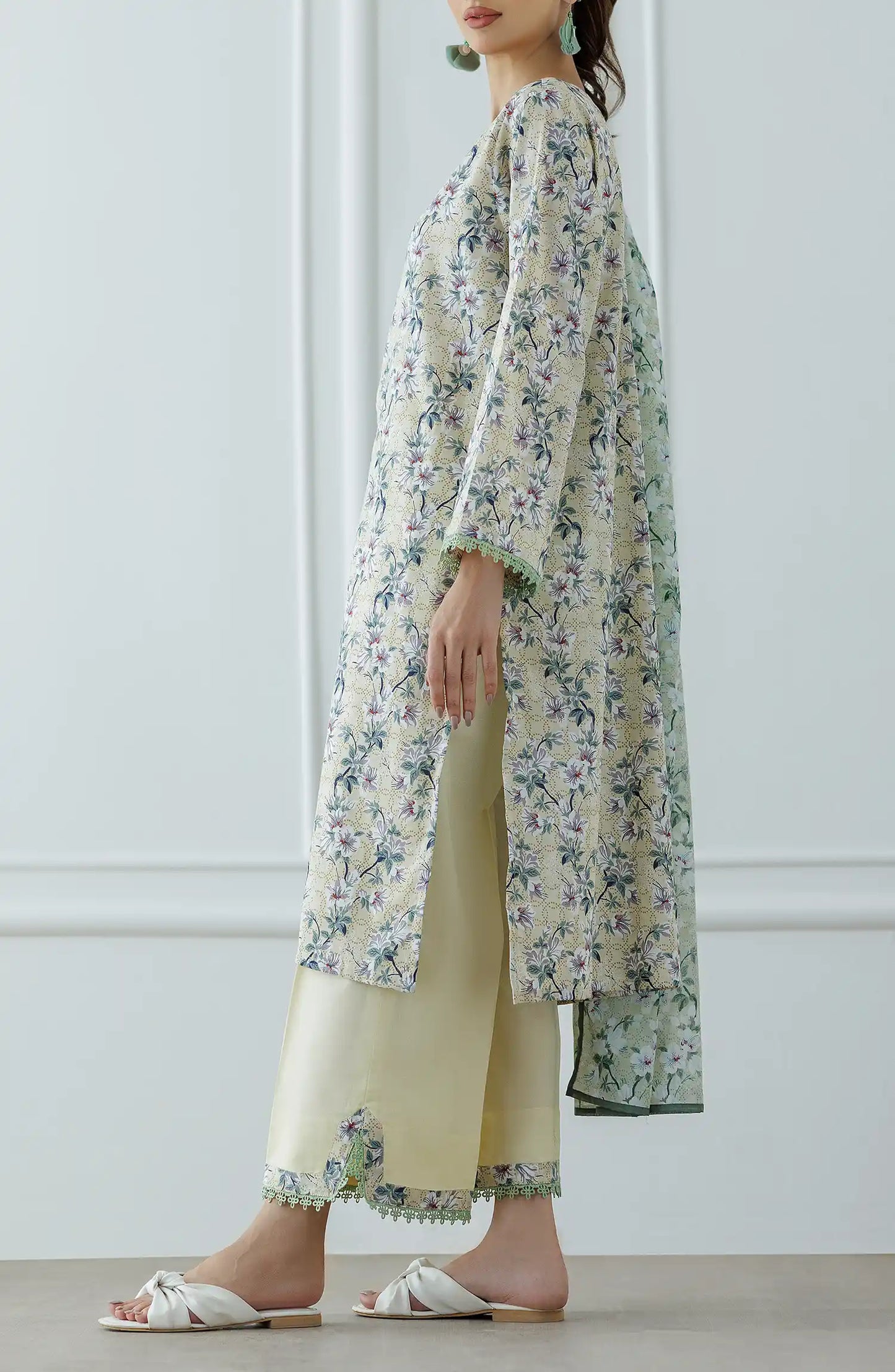 Woman wearing a floral kurta with a matching dupatta against a wide leg palazzo trouser. Stitched Printed Lawn Shirt Dupatta & Pant - 3 Piece Suits - OTL-25-041