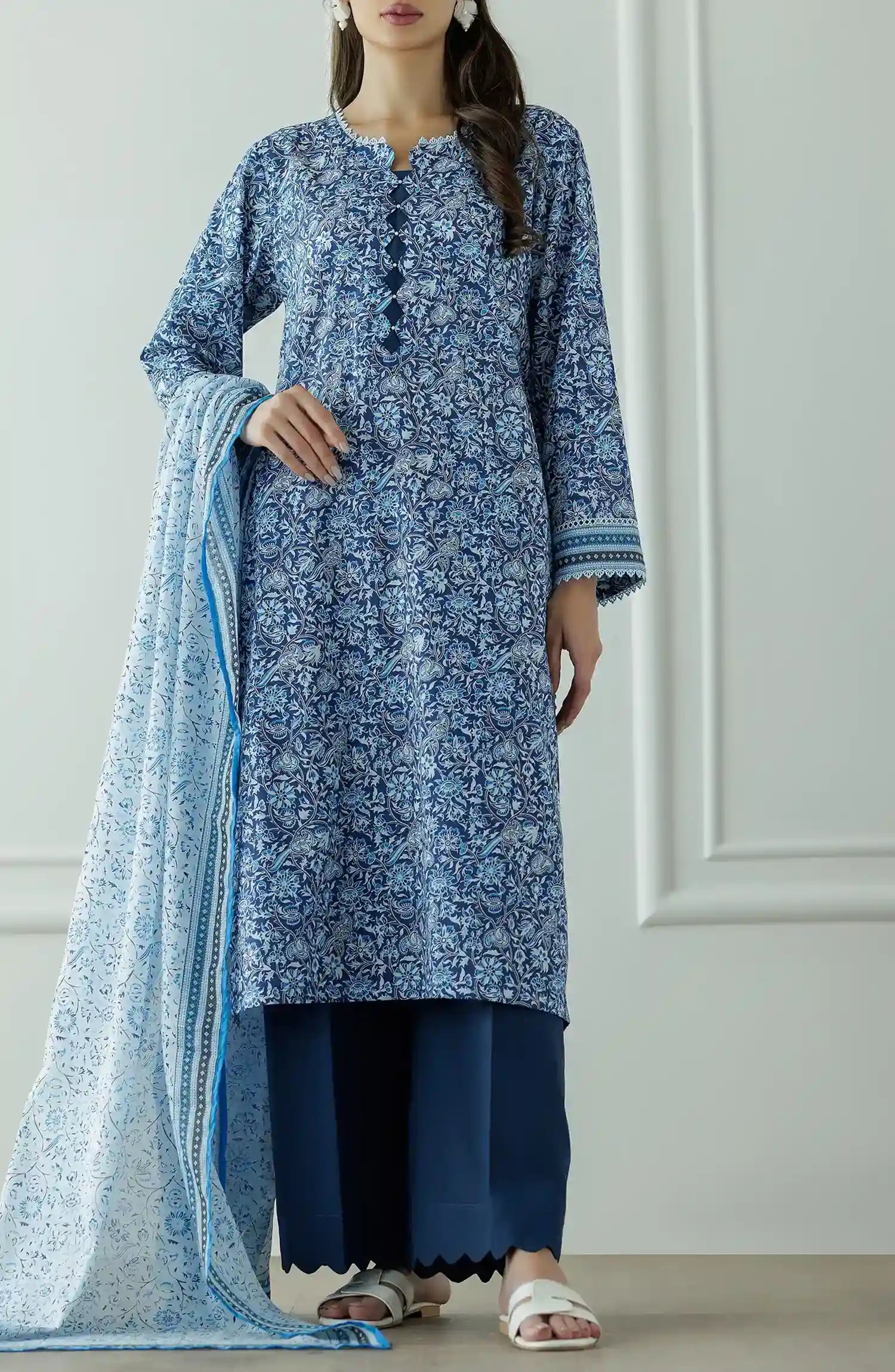 Stitched Printed Lawn Shirt Dupatta & Pant - 3 Piece - OTL-25-044. Woman wearing a patterned dress with a matching dupatta.