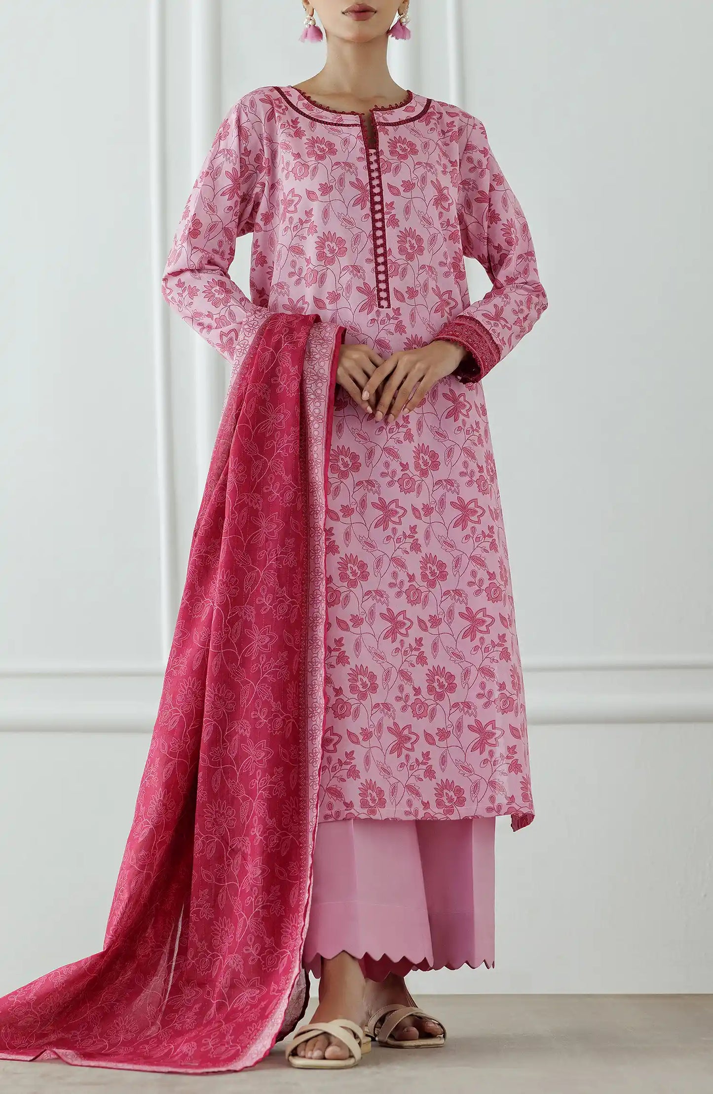 Woman wearing a pink floral kurta with a matching dupatta against a plain trouser. Stitched Printed Lawn Shirt Dupatta & Pant - 3 Piece Suits - OTL-25-058