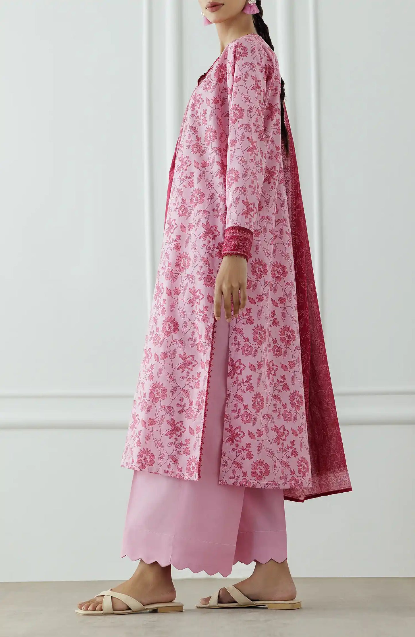Woman wearing a pink floral kurta with a matching dupatta against a plain trouser. Stitched Printed Lawn Shirt Dupatta & Pant - 3 Piece Suits - OTL-25-058