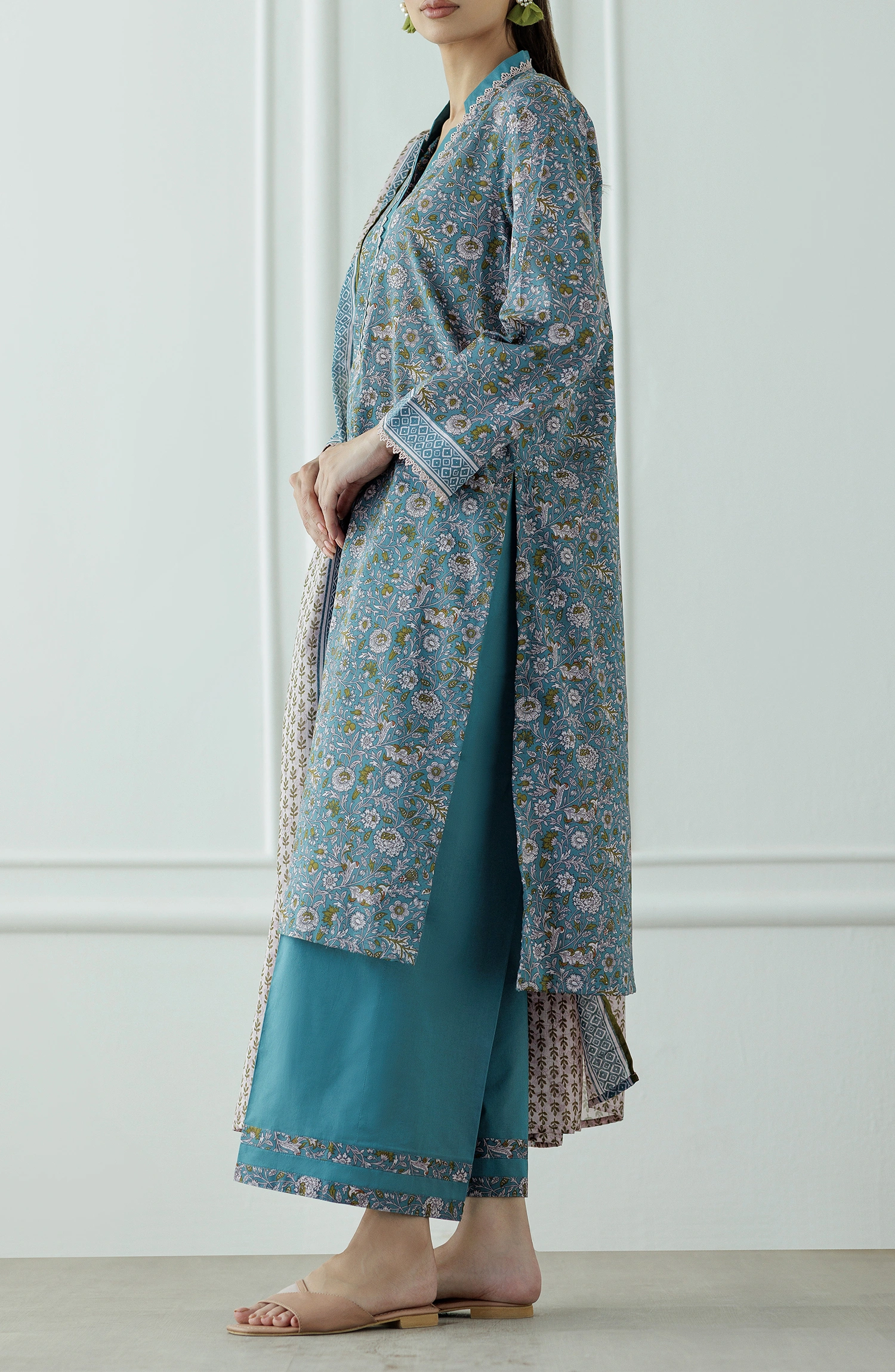Woman wearing a floral blue outfit with a plain trouser & printed dupatta. UNSTITCHED Printed Lawn Shirt Dupatta & Pant - 3 Piece Suits - OTL-25-069