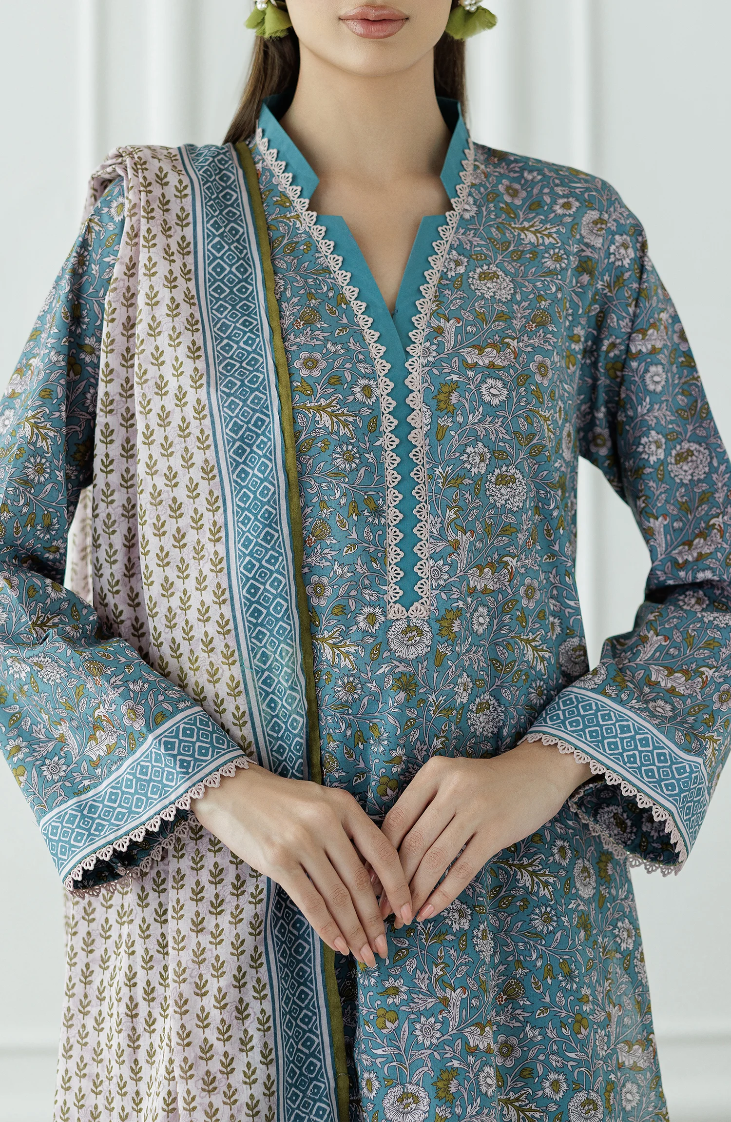 Woman wearing a floral blue outfit with a plain trouser & printed dupatta. UNSTITCHED Printed Lawn Shirt Dupatta & Pant - 3 Piece Suits - OTL-25-069