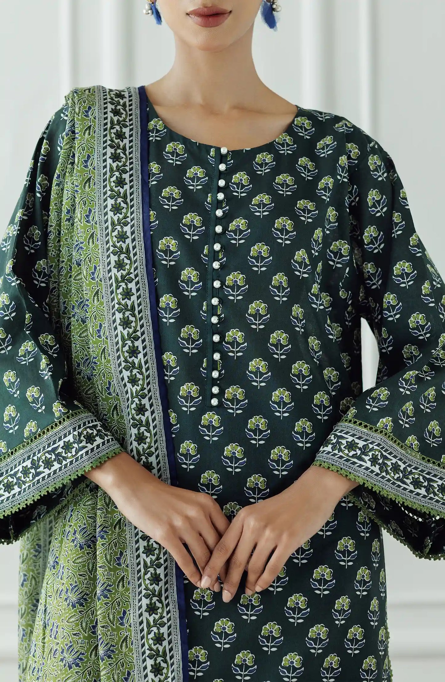 Stitched Printed Lawn Shirt Dupatta & Pant - 3 Piece - OTL-25-306. Woman wearing a patterned dress with a matching dupatta.