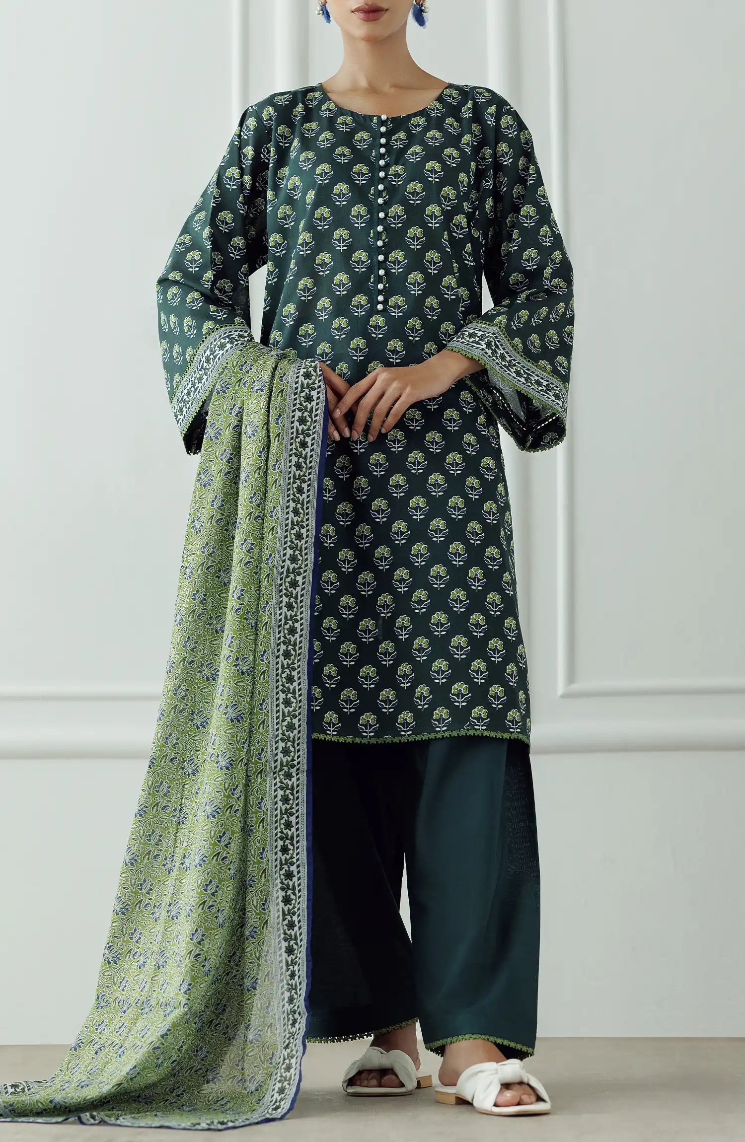 Stitched Printed Lawn Shirt Dupatta & Pant - 3 Piece - OTL-25-306. Woman wearing a patterned dress with a matching dupatta.