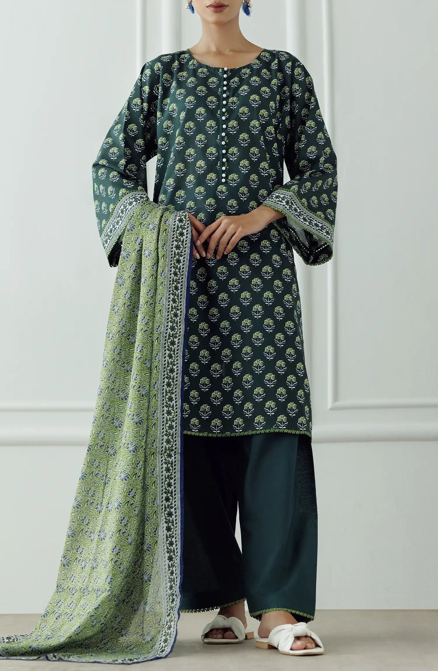 Stitched Printed Lawn Shirt Dupatta & Pant - 3 Piece - OTL-25-306. Woman wearing a patterned dress with a matching dupatta.