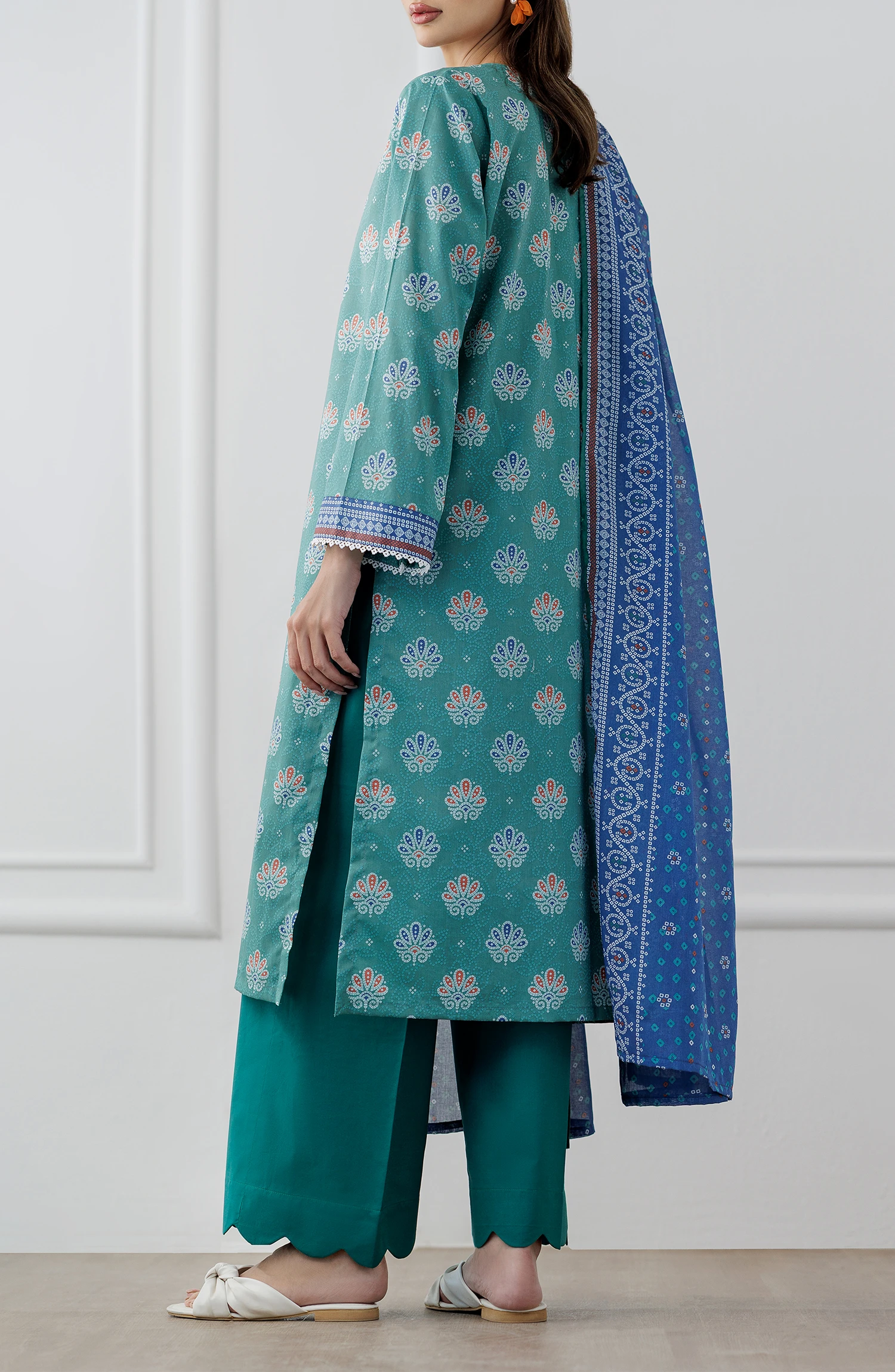 Woman wearing a teal and blue traditional. Stitched Printed Lawn Shirt Dupatta & Pant - 3 Piece Suits - OTL-25-307
