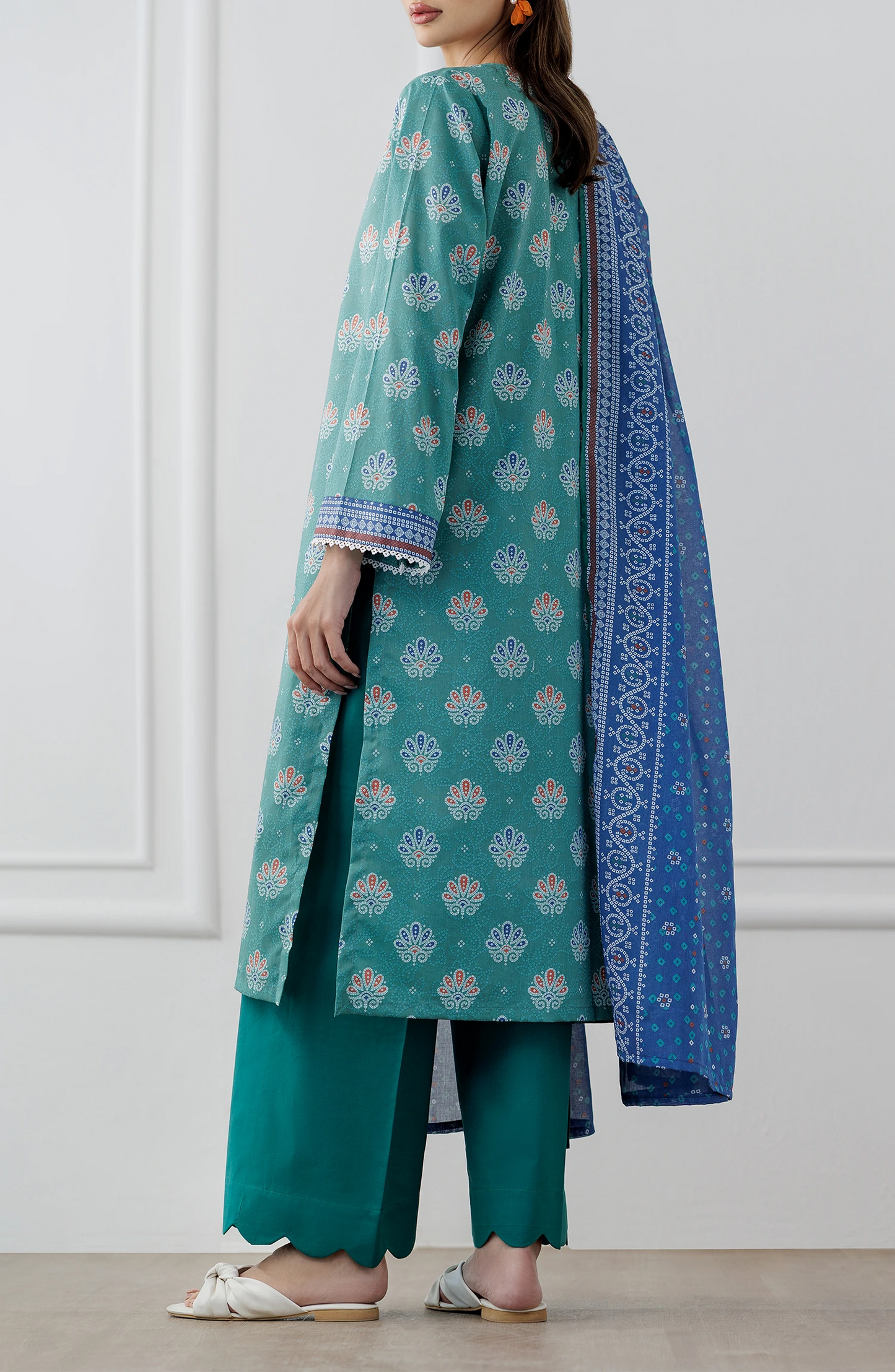 Woman wearing a teal and blue traditional. Stitched Printed Lawn Shirt Dupatta & Pant - 3 Piece Suits - OTL-25-307