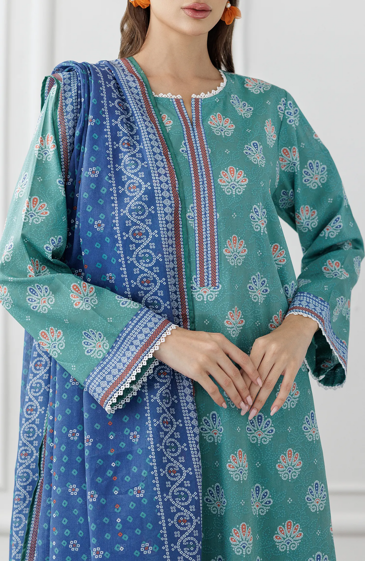 Woman wearing a teal and blue traditional. Stitched Printed Lawn Shirt Dupatta & Pant - 3 Piece Suits - OTL-25-307