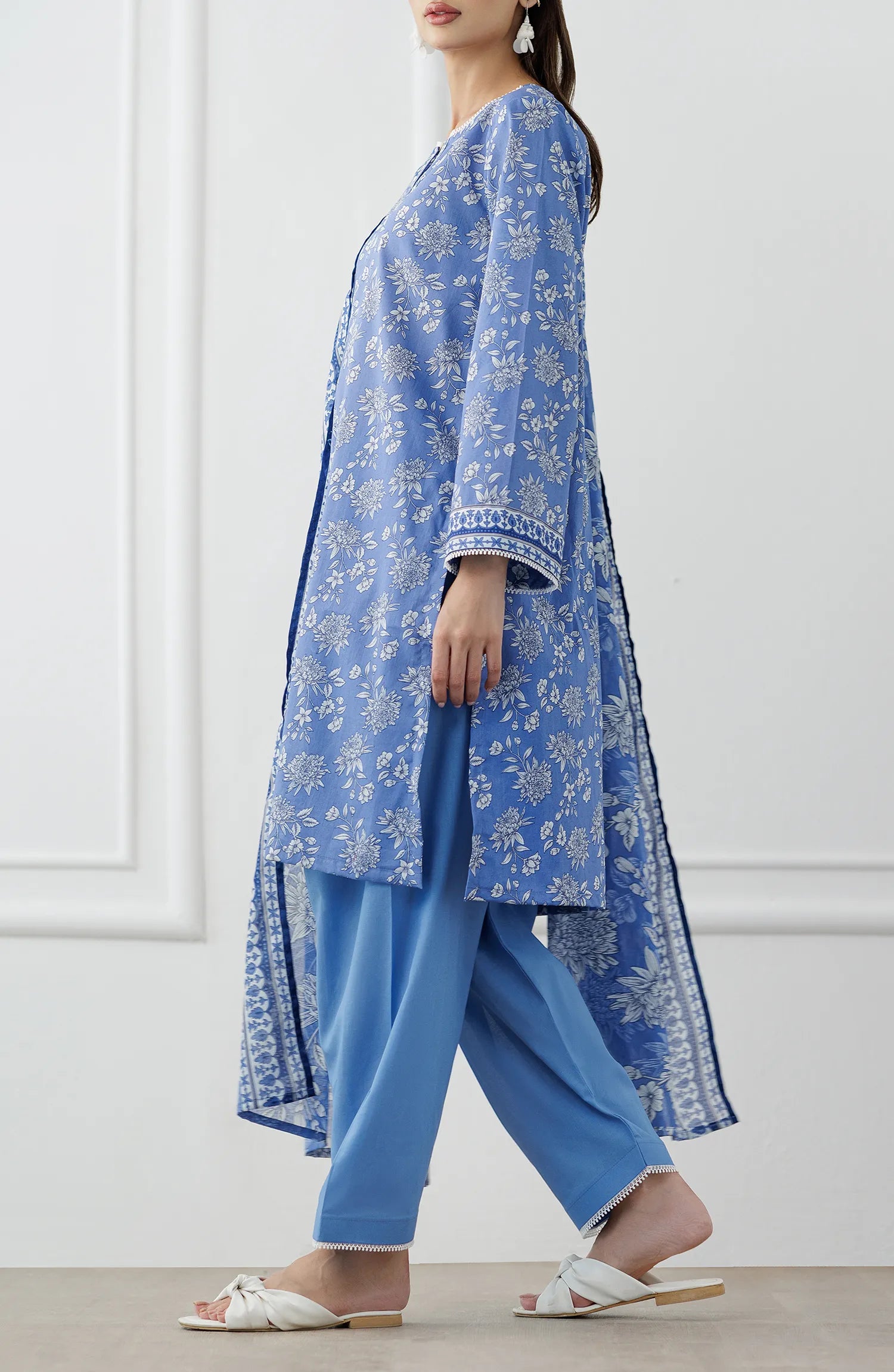 Woman wearing a blue embroidered outfit with a matching dupatta on a dyed trouser. Stitched Printed Lawn Shirt Dupatta & Pant - 3 Piece Suits - OTL-25-338