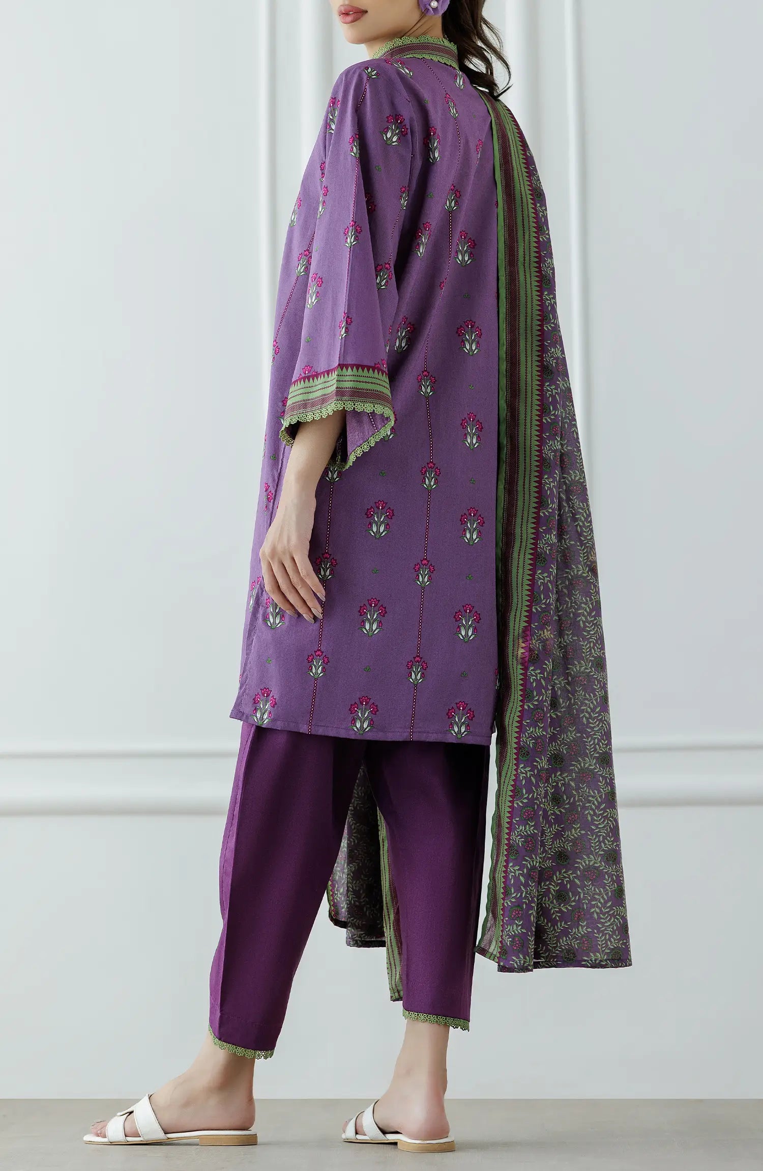 Women wearing a purple traditional outfit with a matching dupatta on a plain shalwar. Stitched Printed Lawn Shirt Dupatta & Pant - 3 Piece Suits - OTL-25-342