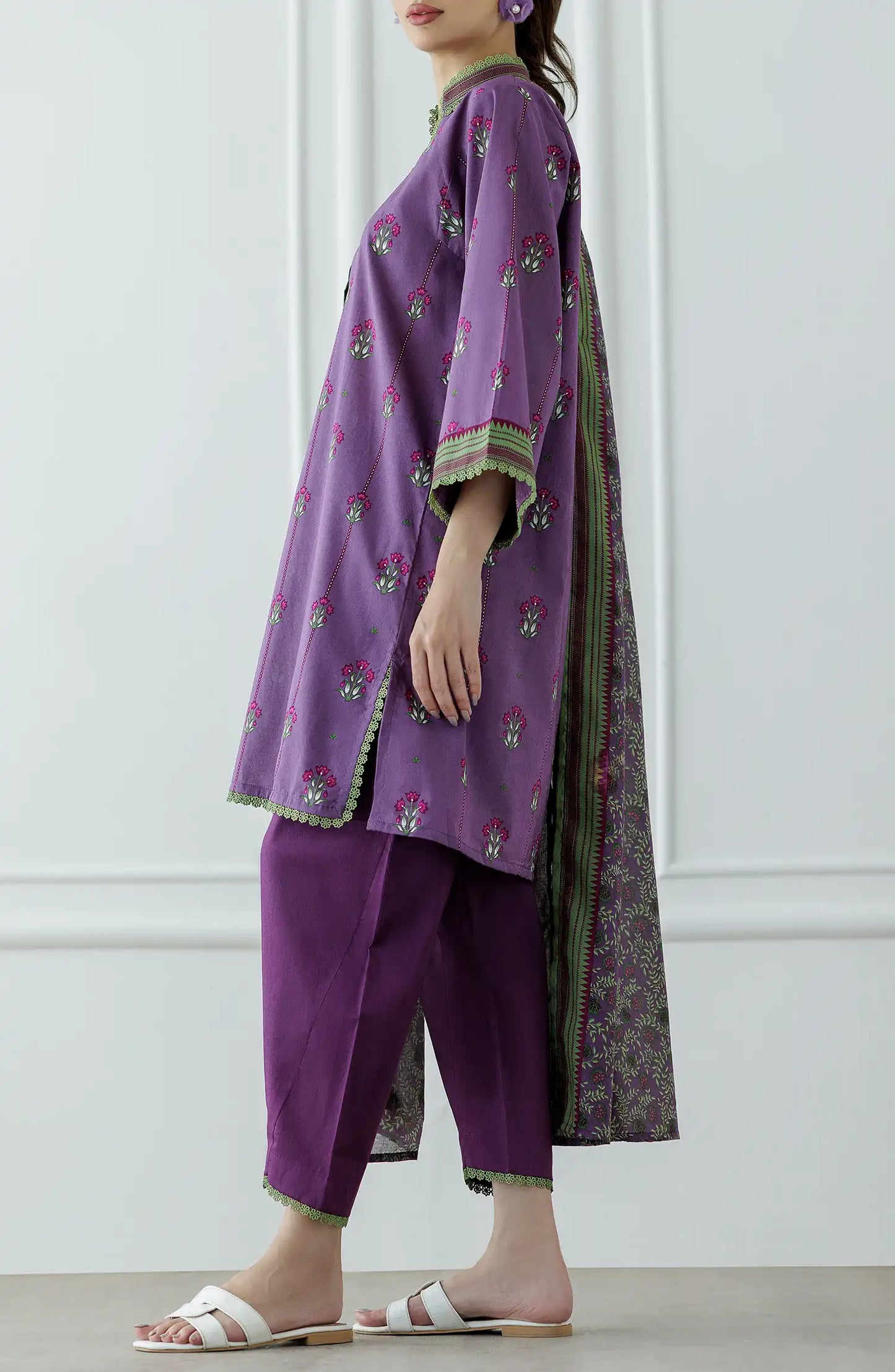 Women wearing a purple traditional outfit with a matching dupatta on a plain shalwar. Stitched Printed Lawn Shirt Dupatta & Pant - 3 Piece Suits - OTL-25-342