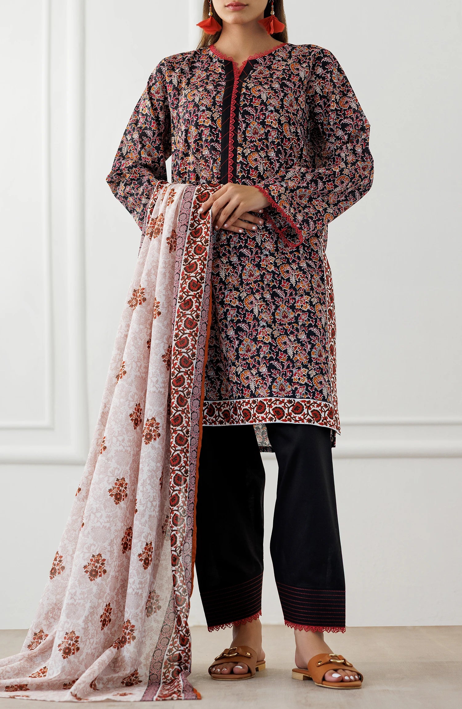 Woman wearing a floral kurta with a matching dupatta on a black dyed shalwar. Unstitched Printed Lawn Shirt Dupatta & Pant - 3 Piece Suits - OTL-25-348