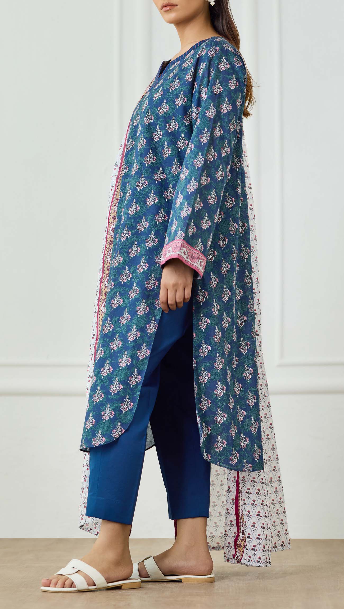Woman wearing a blue printed kurta with a matching dupatta on a plain trouser. Unstitched Printed Lawn Shirt Dupatta & Pant - 3 Piece Suits - OTL-25-500