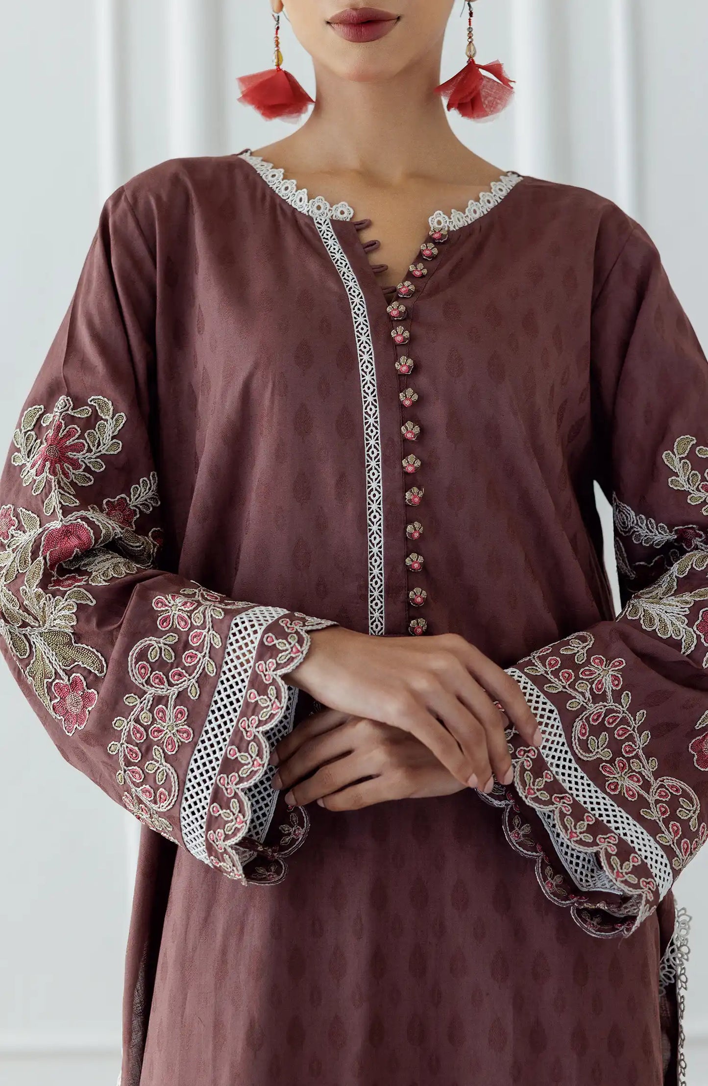 Woman wearing a brown embroidered dress with dyed trouser. Stitched Luxury Premium Embroidered Lawn Shirt & Pant - 2 Piece Suits (Co-ord Set) - WRCJ25S-2002