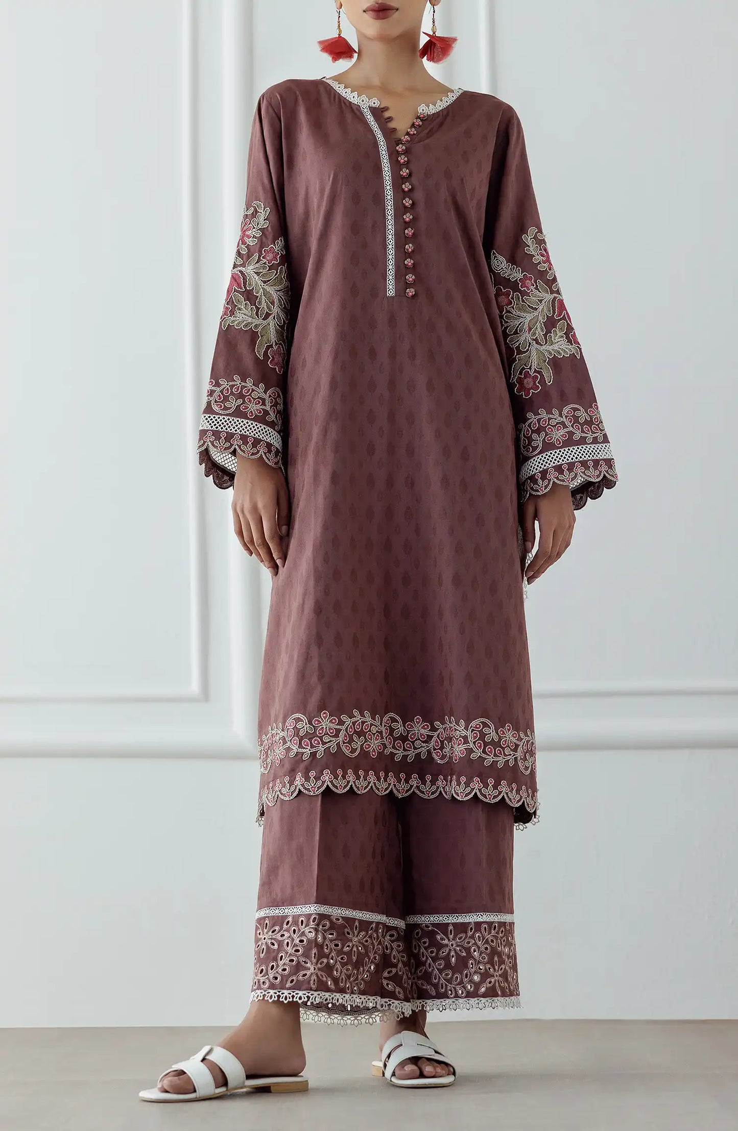 Woman wearing a brown embroidered dress with dyed trouser. Stitched Luxury Premium Embroidered Lawn Shirt & Pant - 2 Piece Suits (Co-ord Set) - WRCJ25S-2002