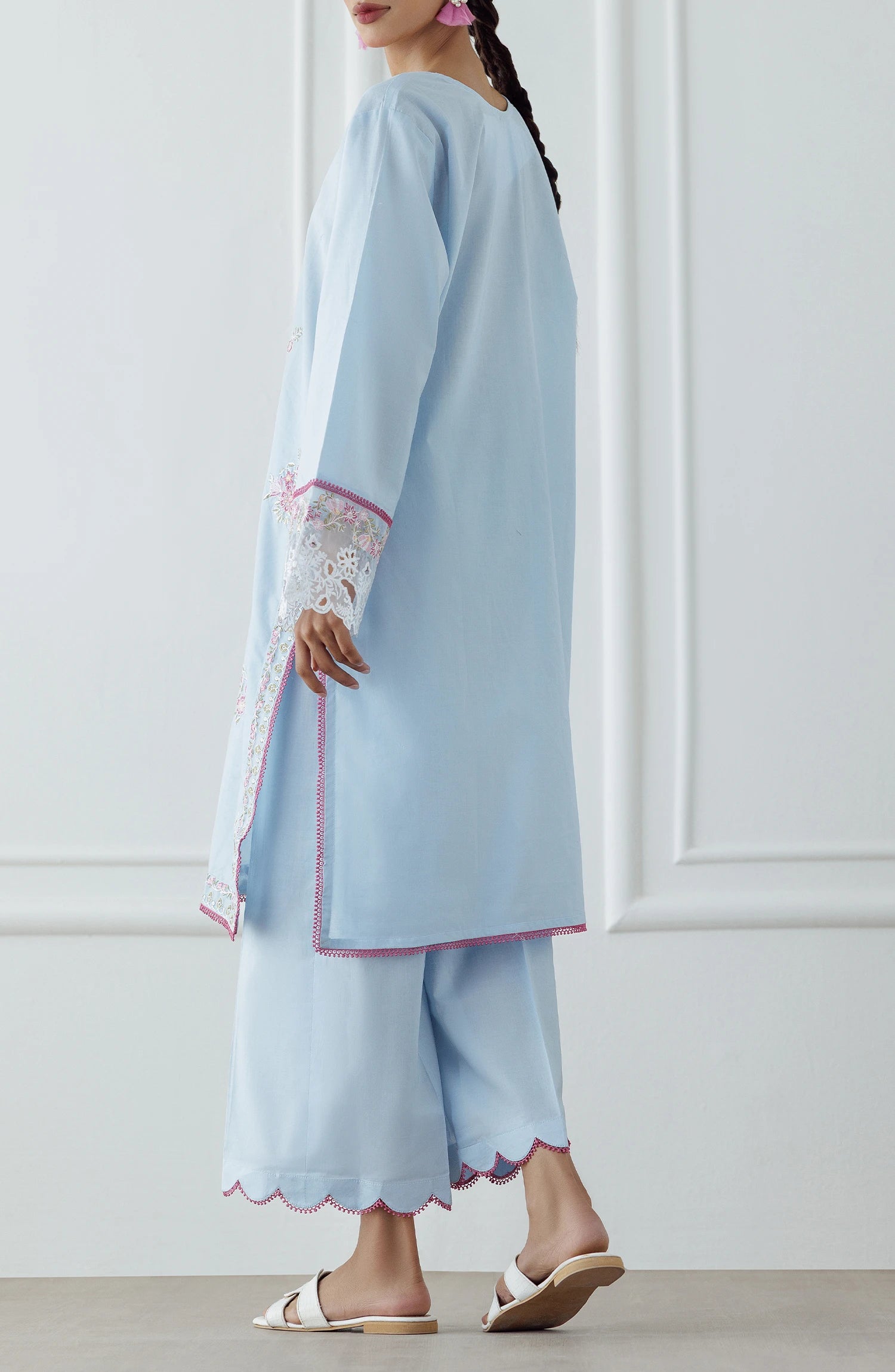 Women wearing a Light blue dress with intricate embroidery on a dyed trouser. Stitched Luxury Premium Embroidered Lawn Shirt & Pant - 2 Piece Suits (Co-ord Set) - WRCJ25S-2007