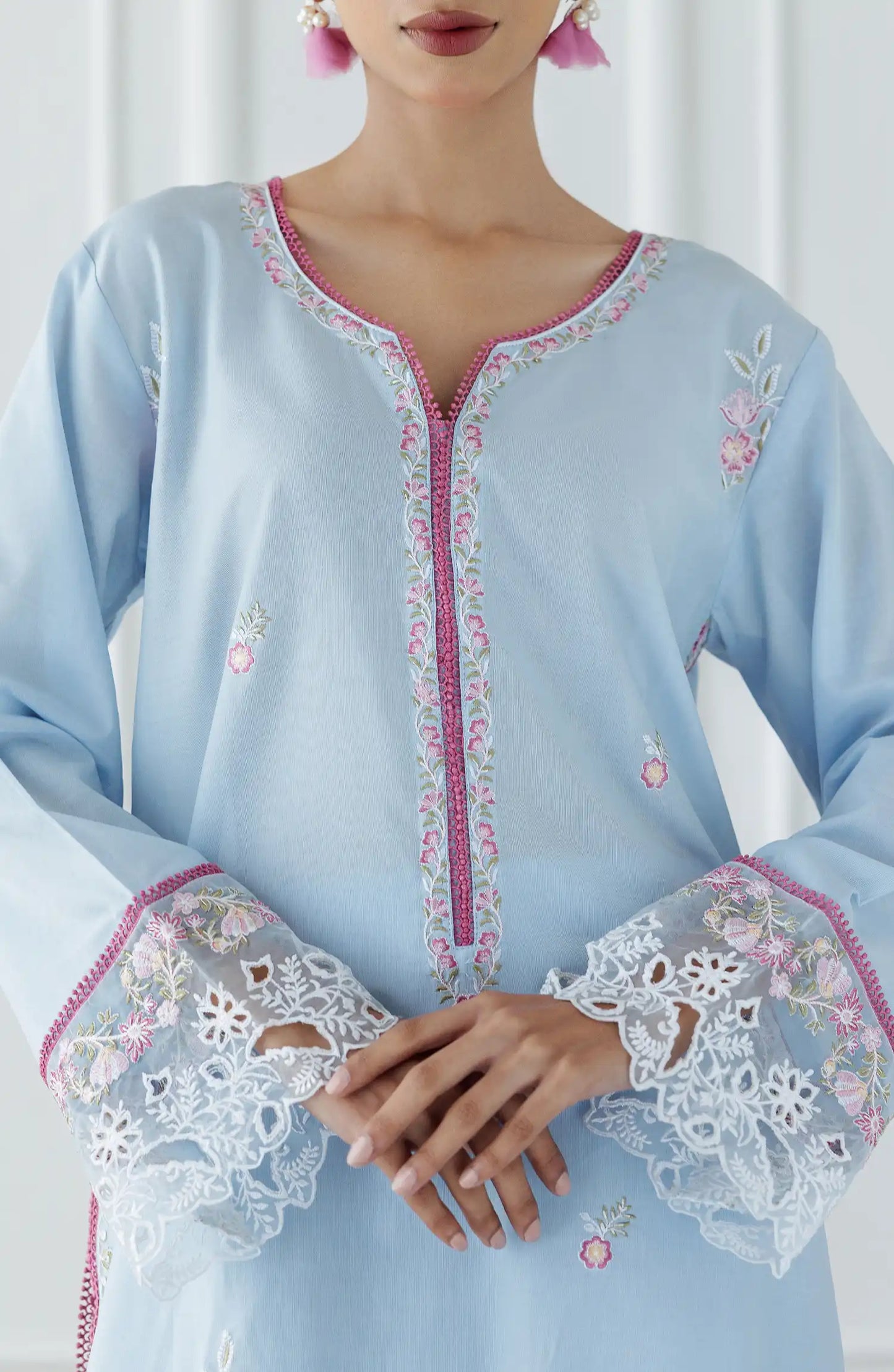 Women wearing a Light blue dress with intricate embroidery on a dyed trouser. Stitched Luxury Premium Embroidered Lawn Shirt & Pant - 2 Piece Suits (Co-ord Set) - WRCJ25S-2007