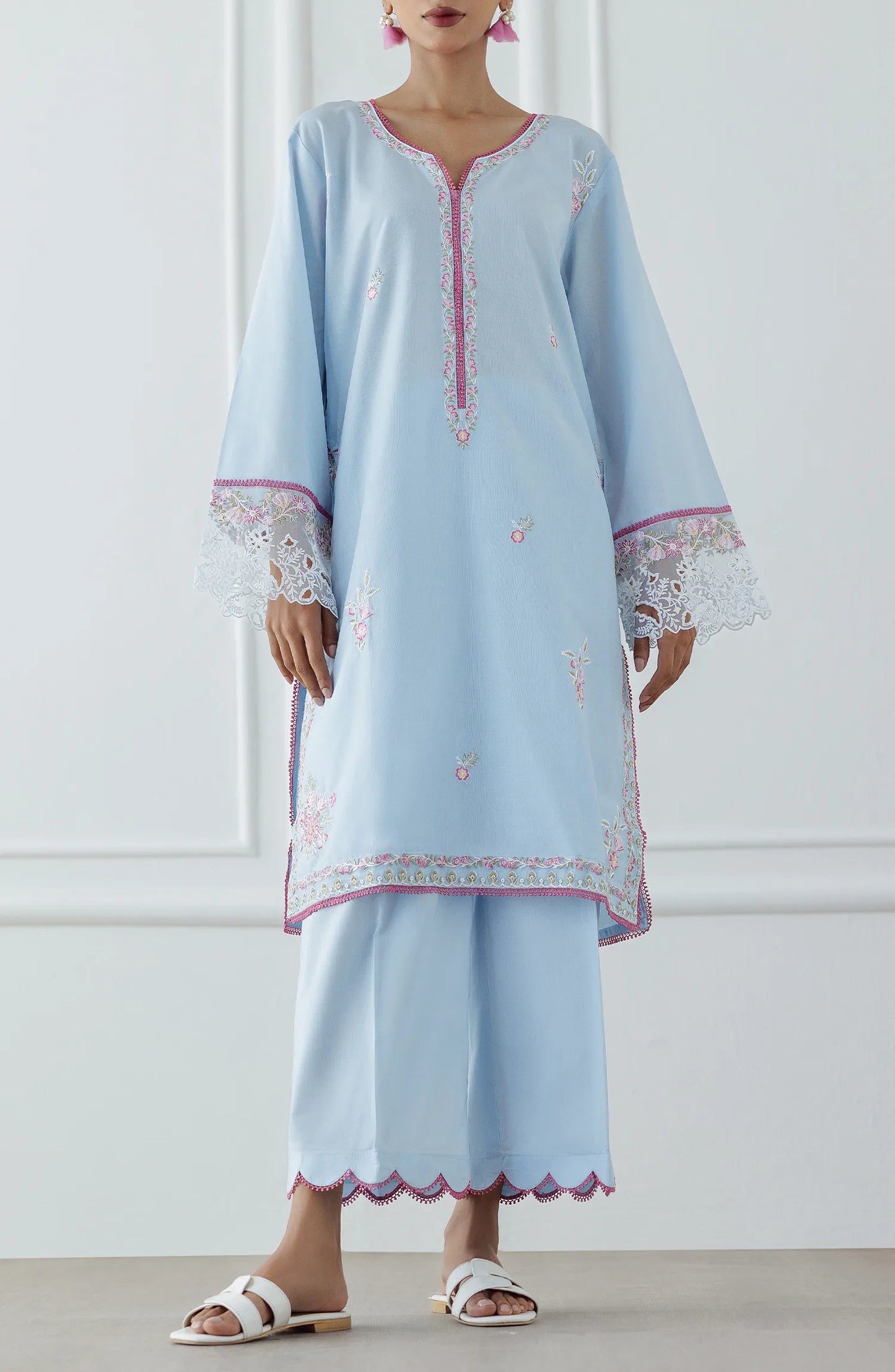 Women wearing a Light blue dress with intricate embroidery on a dyed trouser. Stitched Luxury Premium Embroidered Lawn Shirt & Pant - 2 Piece Suits (Co-ord Set) - WRCJ25S-2007