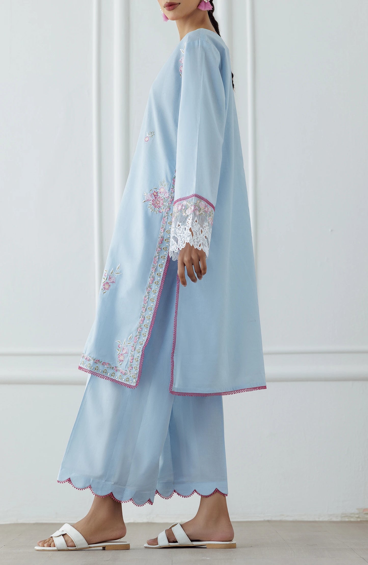 Women wearing a Light blue dress with intricate embroidery on a dyed trouser. Stitched Luxury Premium Embroidered Lawn Shirt & Pant - 2 Piece Suits (Co-ord Set) - WRCJ25S-2007