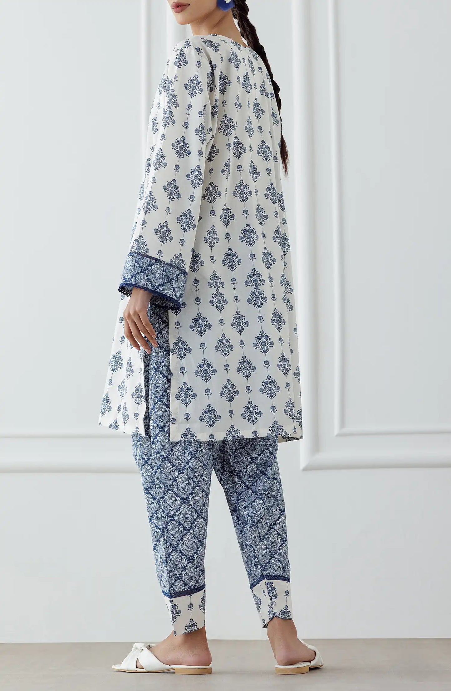 Women wearing a blue and white patterned kurta with matching pants. Stitched Printed Lawn Shirt & Pant - 2 Piece (Co-ord Set) - WRCV25S-2011